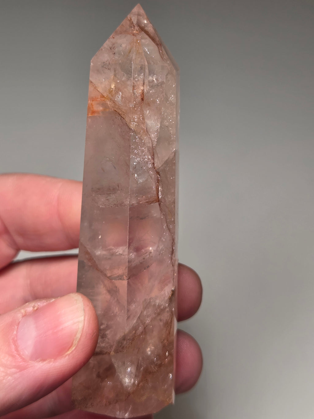 Fire quartz crystal tower with imperfections