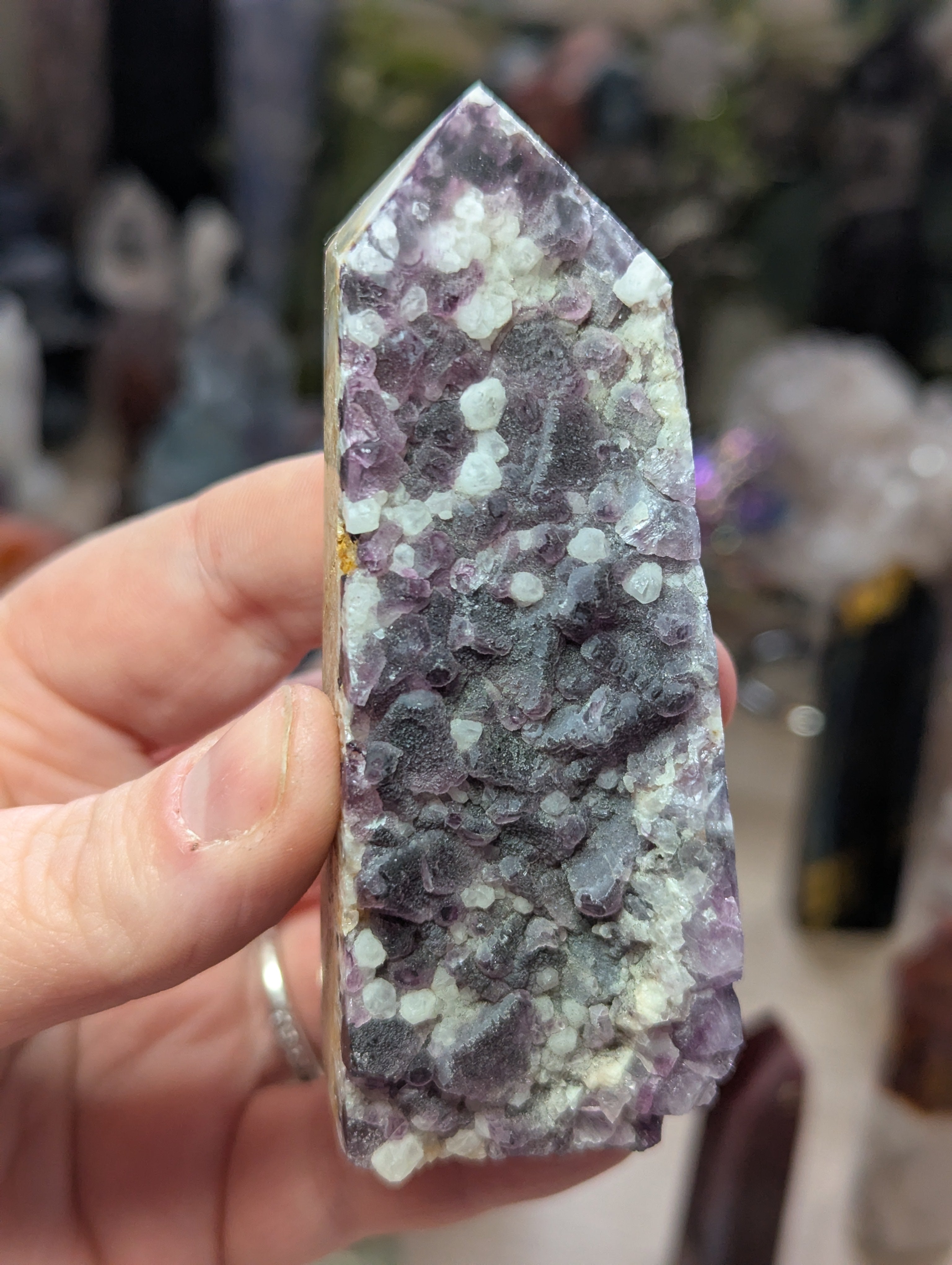 Raw flourite crystal tower carving
