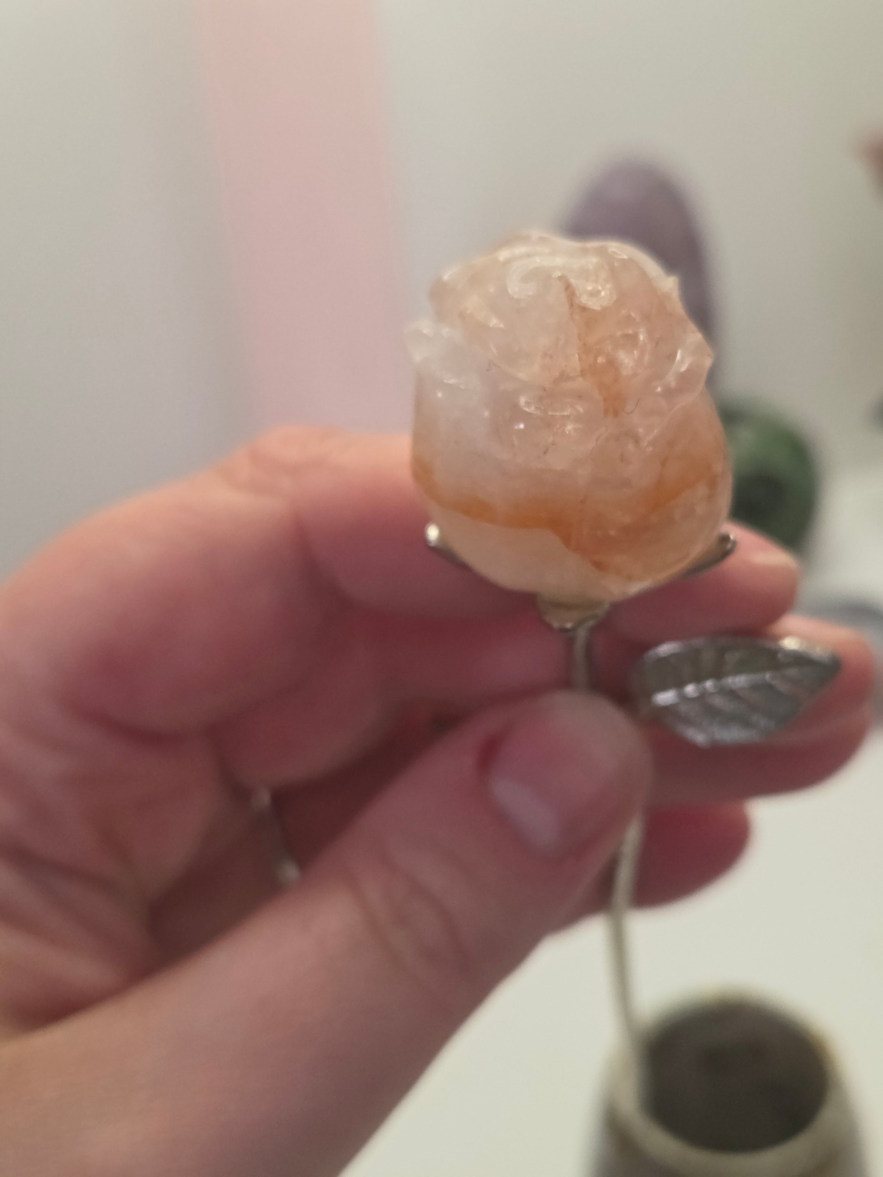 Fire quartz crystal rose carving on a stem