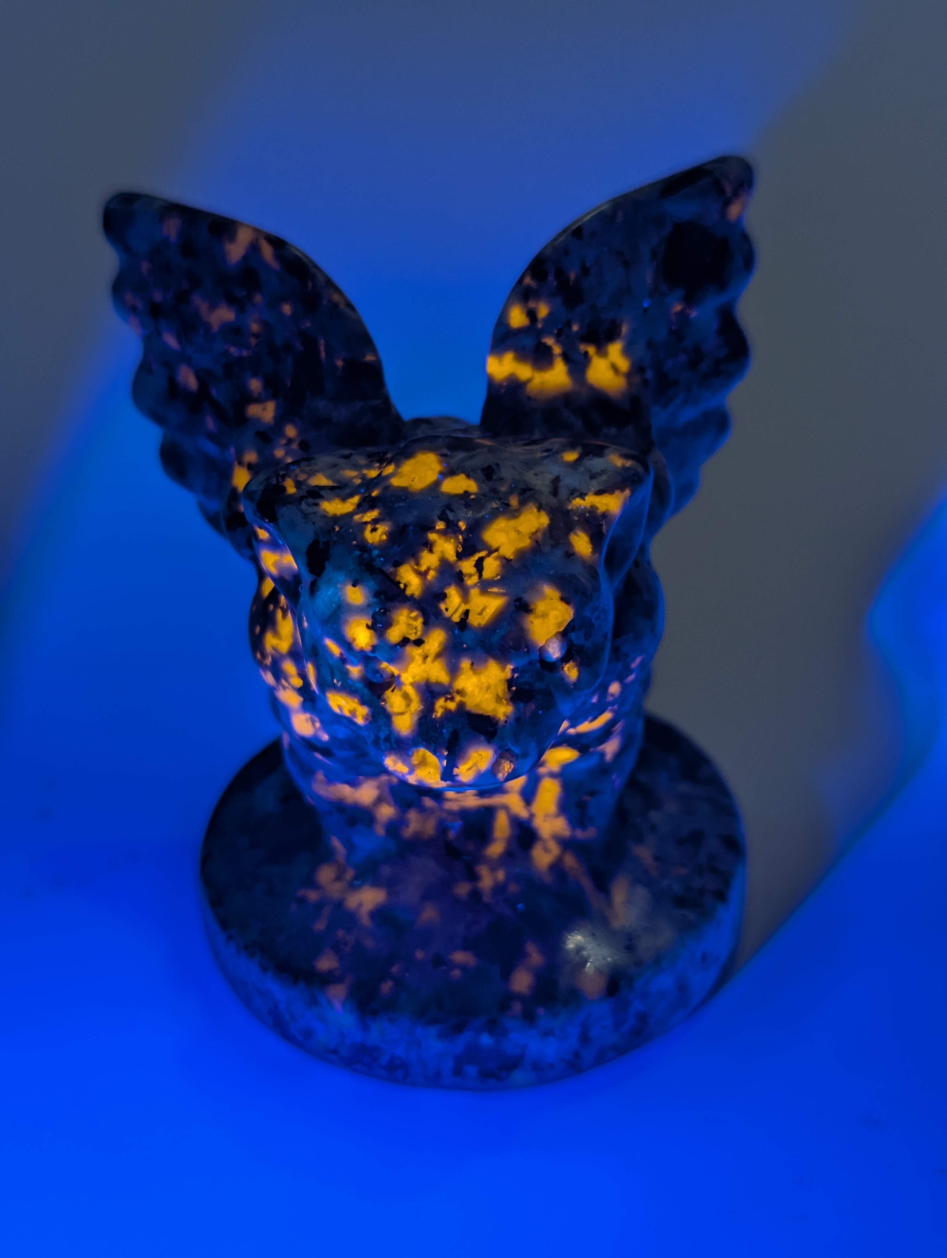 Yooperlite crystal Gargoyle carving orange UV