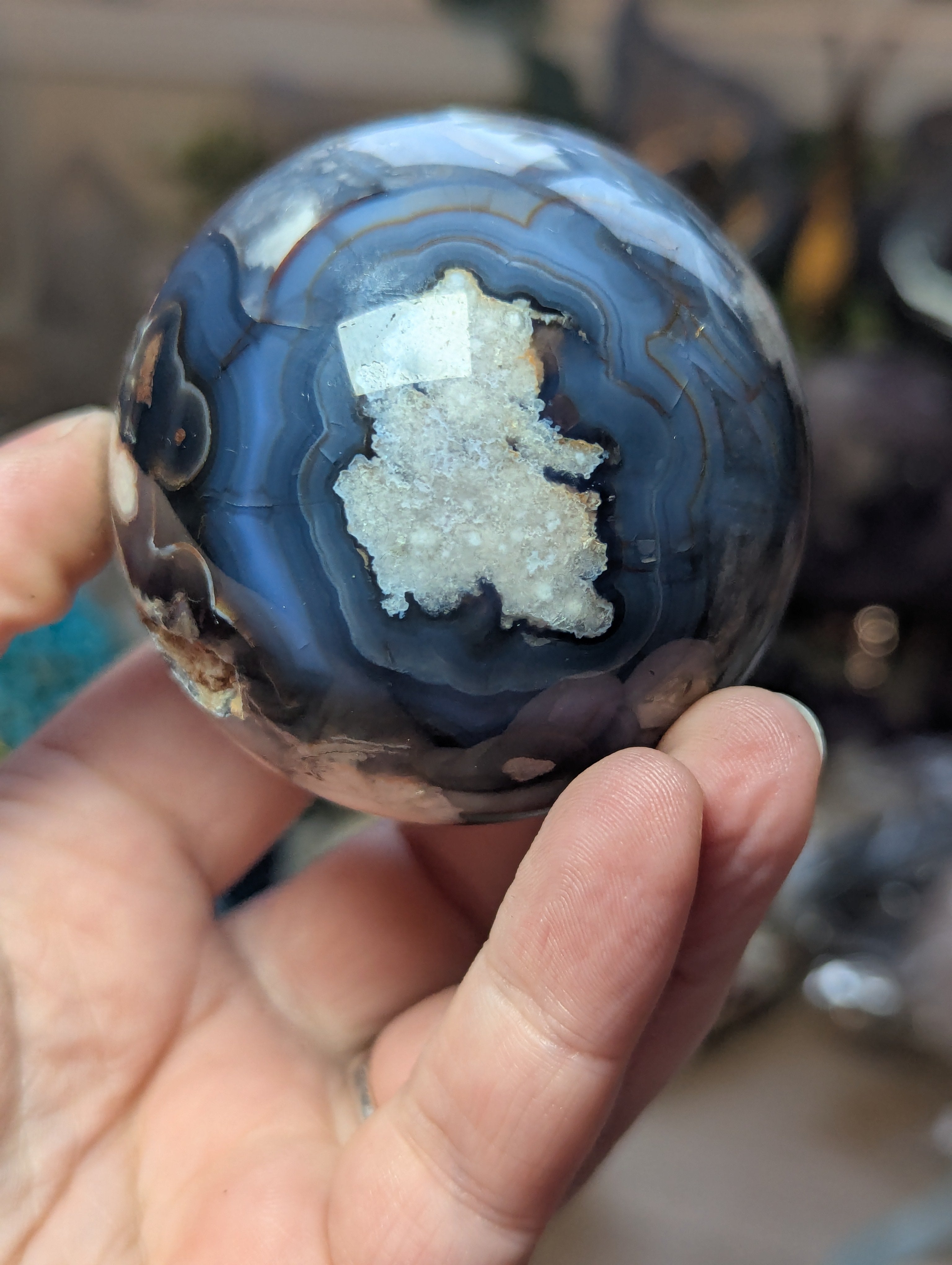 Blue  flower agate crystal sphere with stand