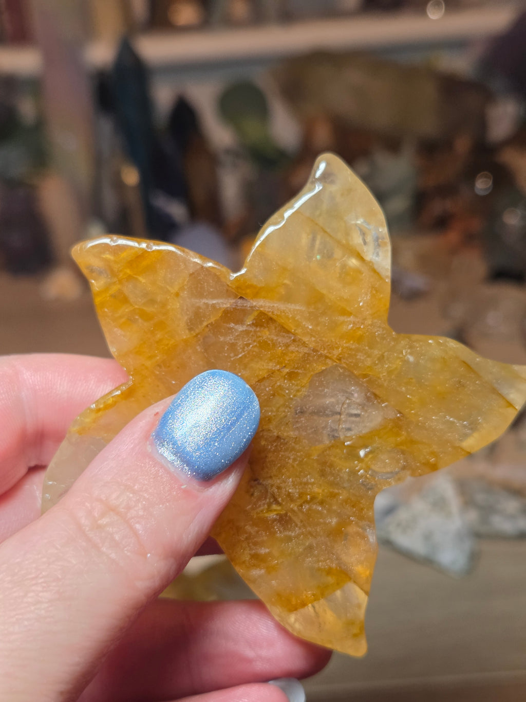 Golden healer star fish carving