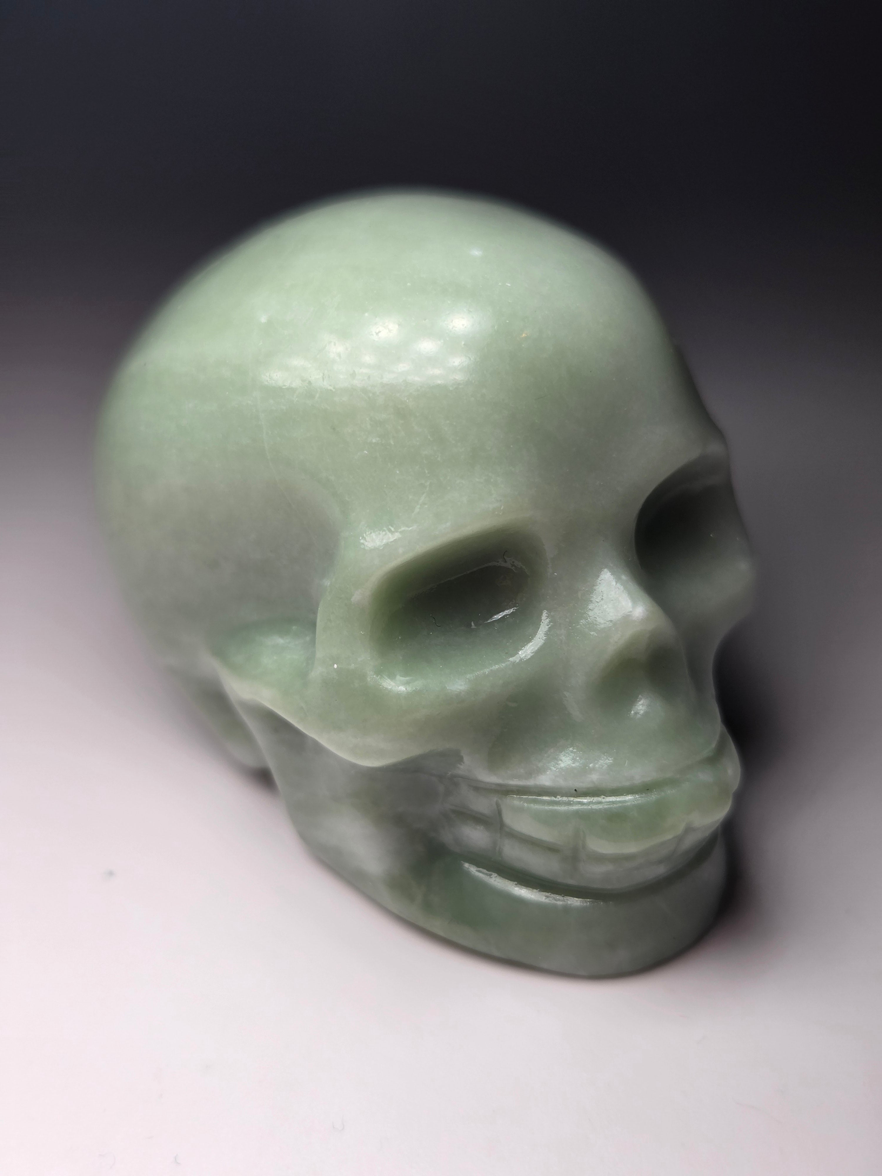 Green jade crystal skull carving