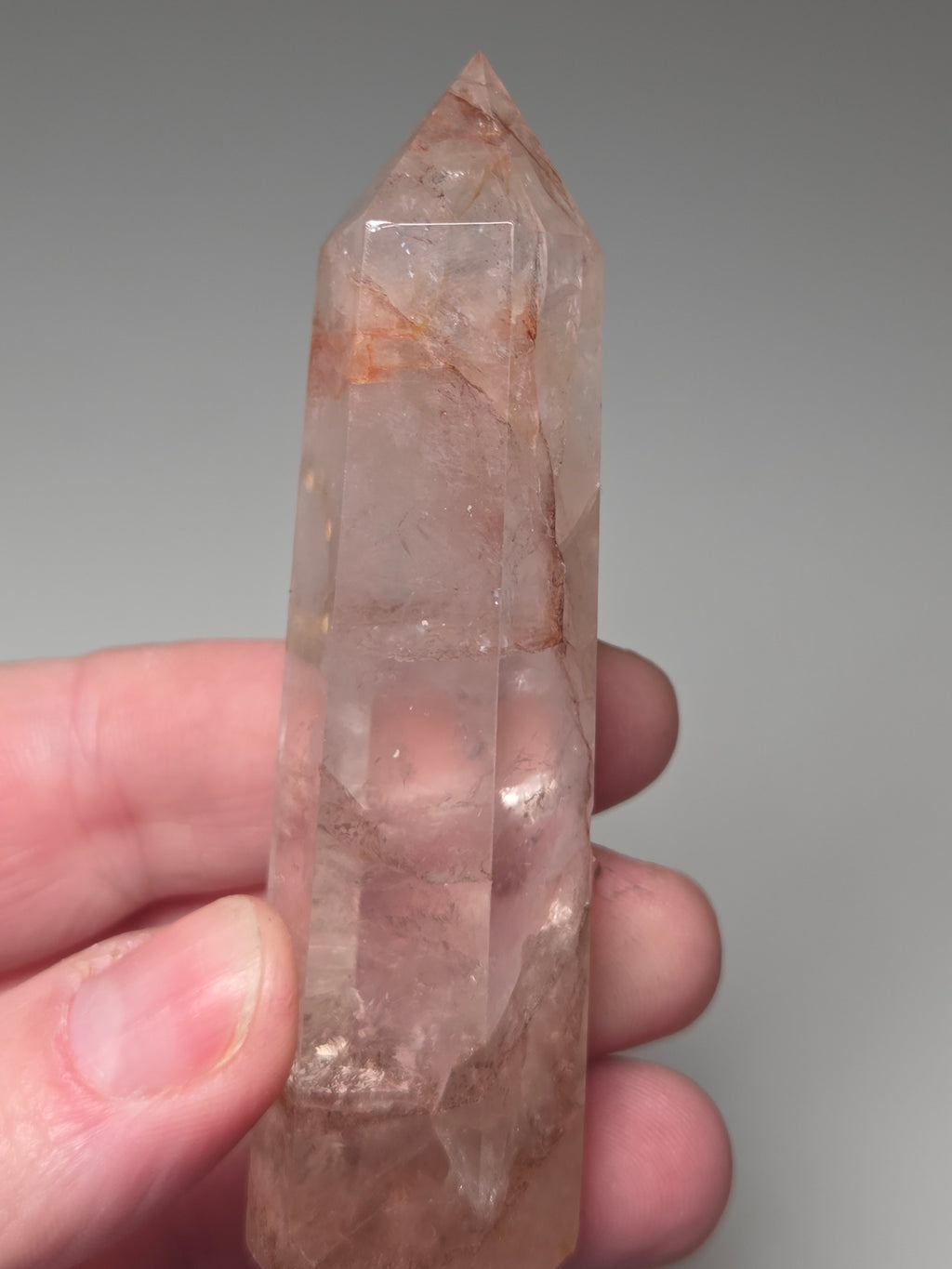 Fire quartz crystal tower with imperfections