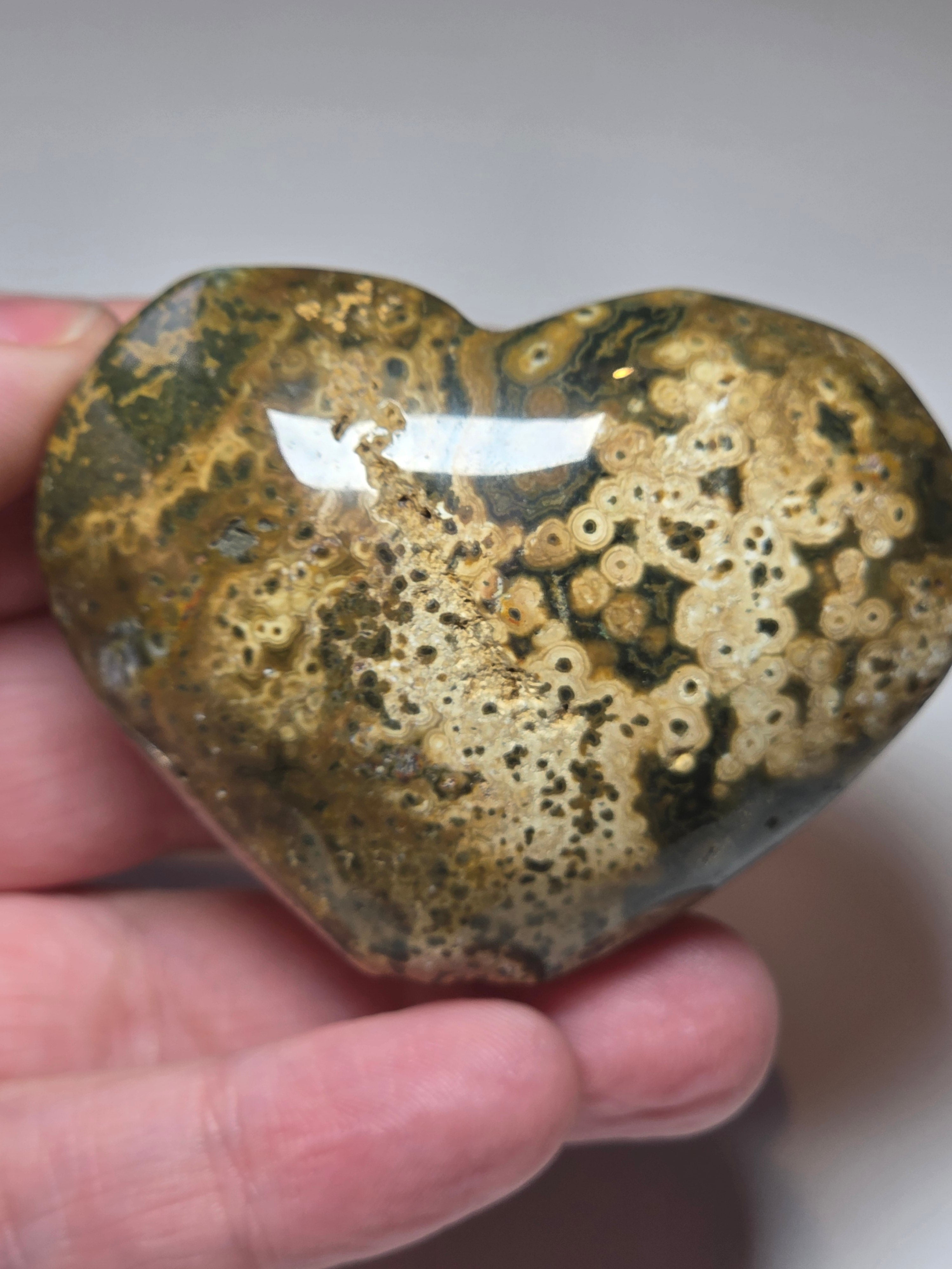 Ocean Jasper crystal heart carving with imperfections