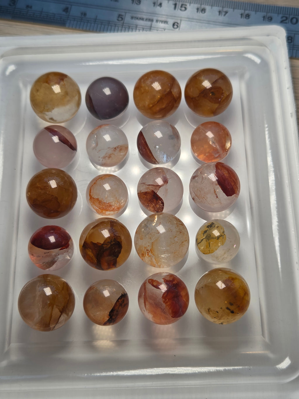 Mini crystal sphere fire quartz and golden healer- with stand