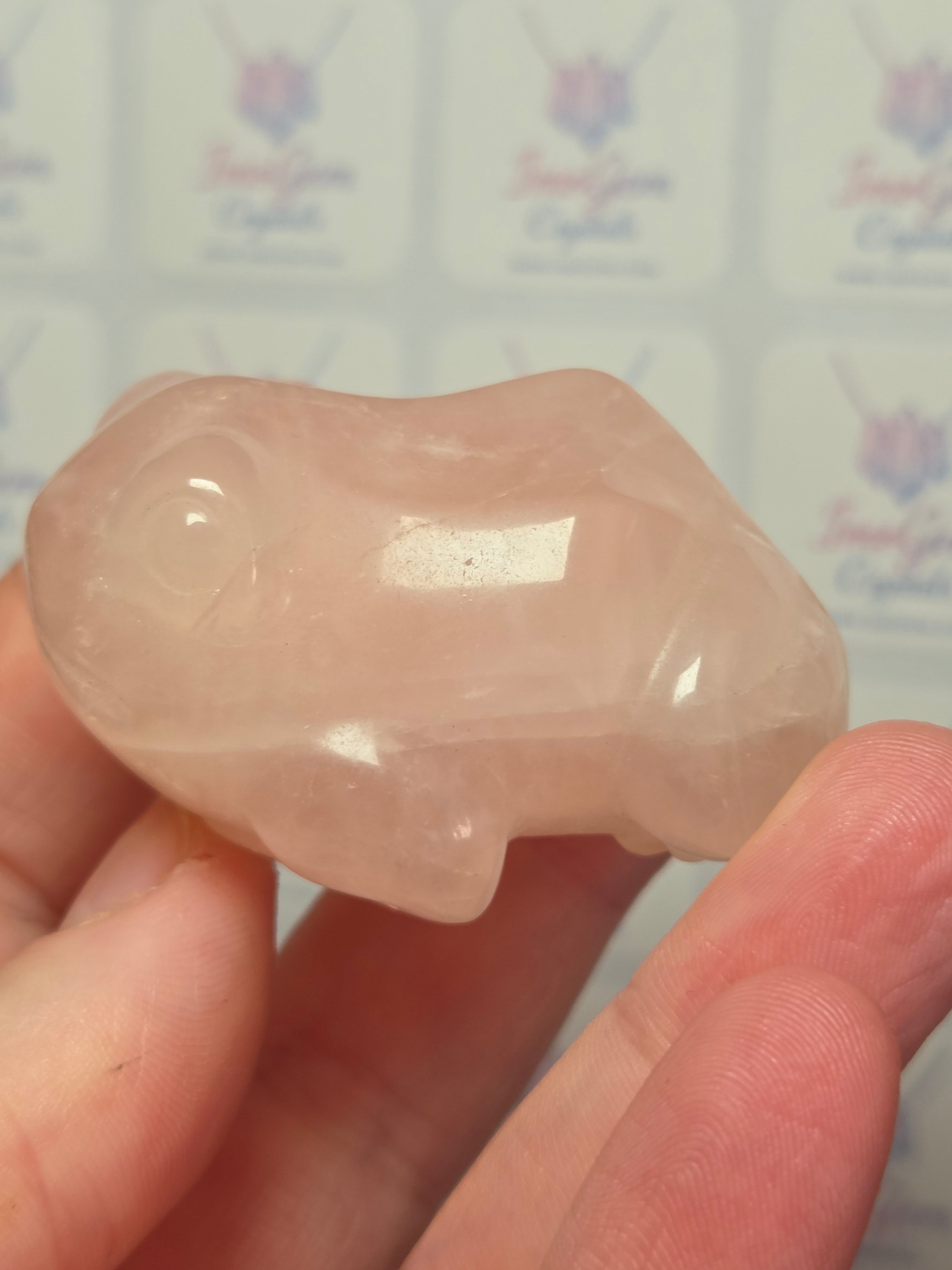 Rose quartz crystal frog carving