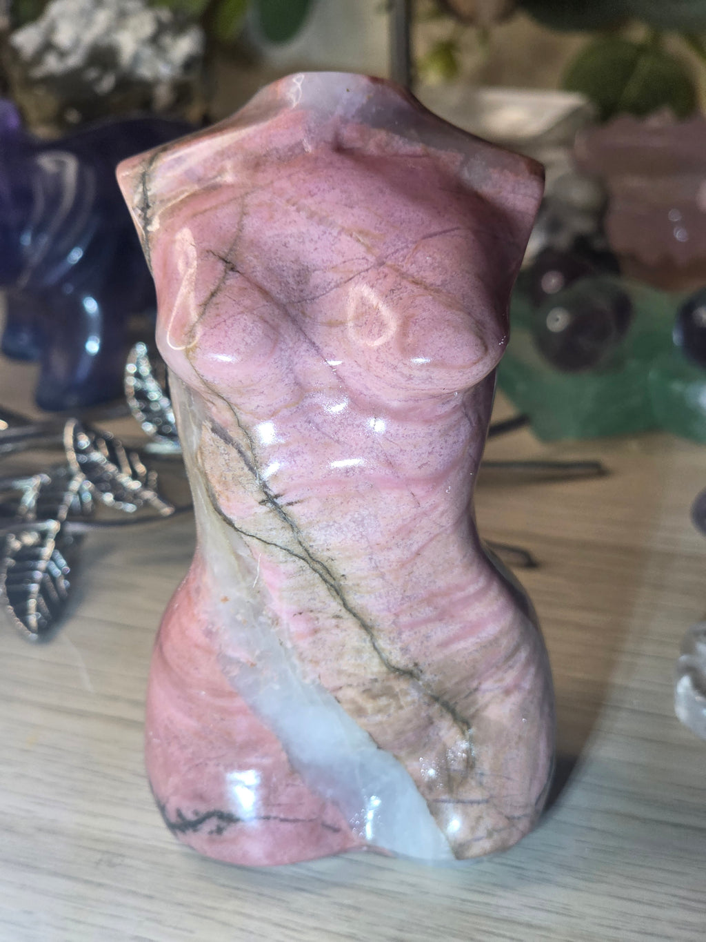 Rhodonite crystal female body carving