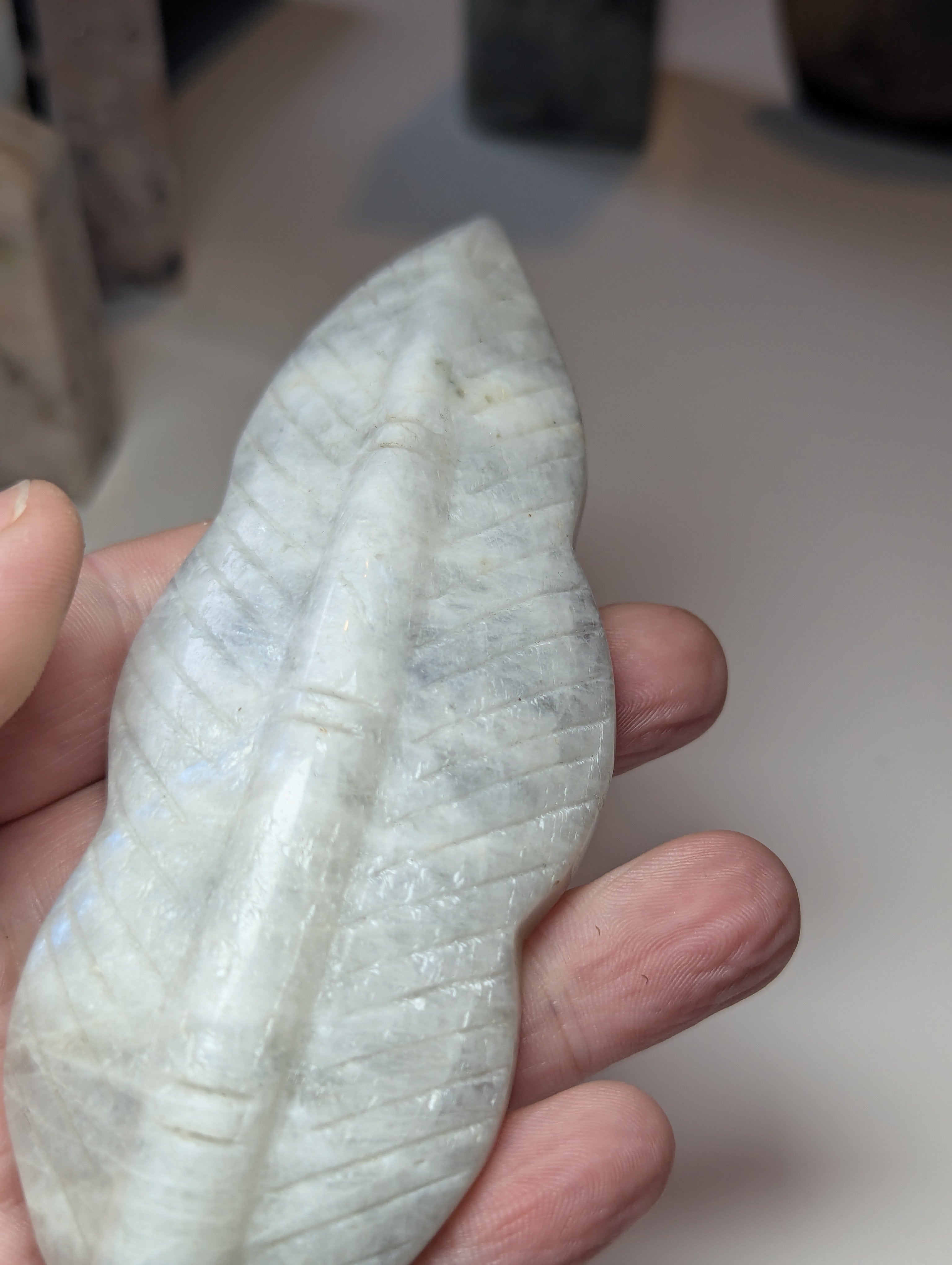 Rainbow moonstone crystal feather carving