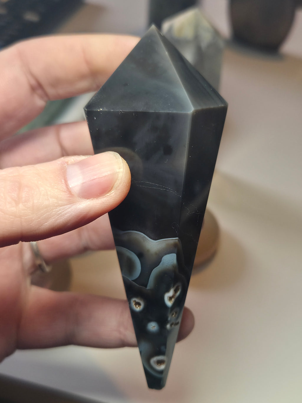 Sardonyx crystal wand with stand may have imperfections