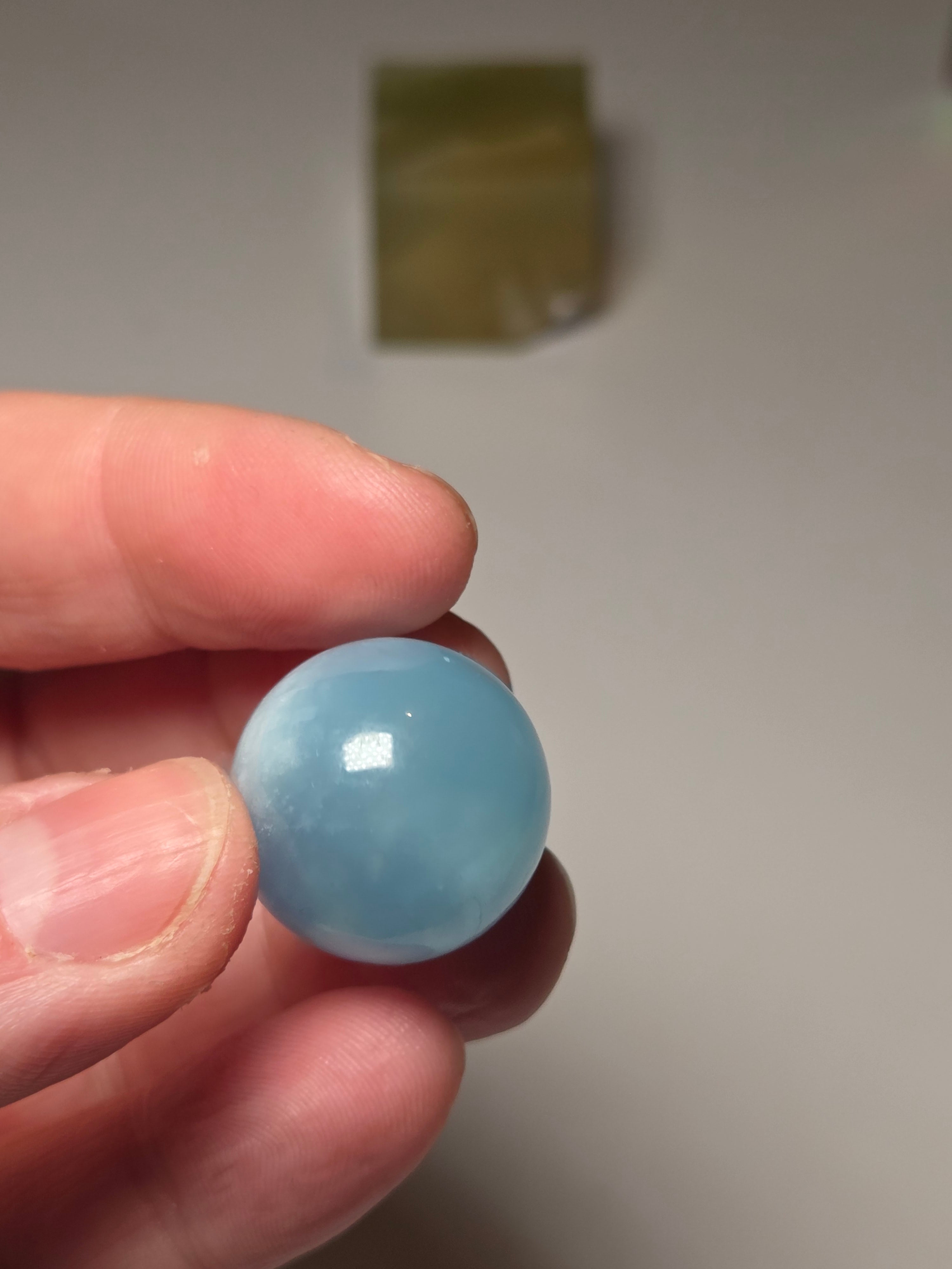 Aquamarine crystal sphere with stand