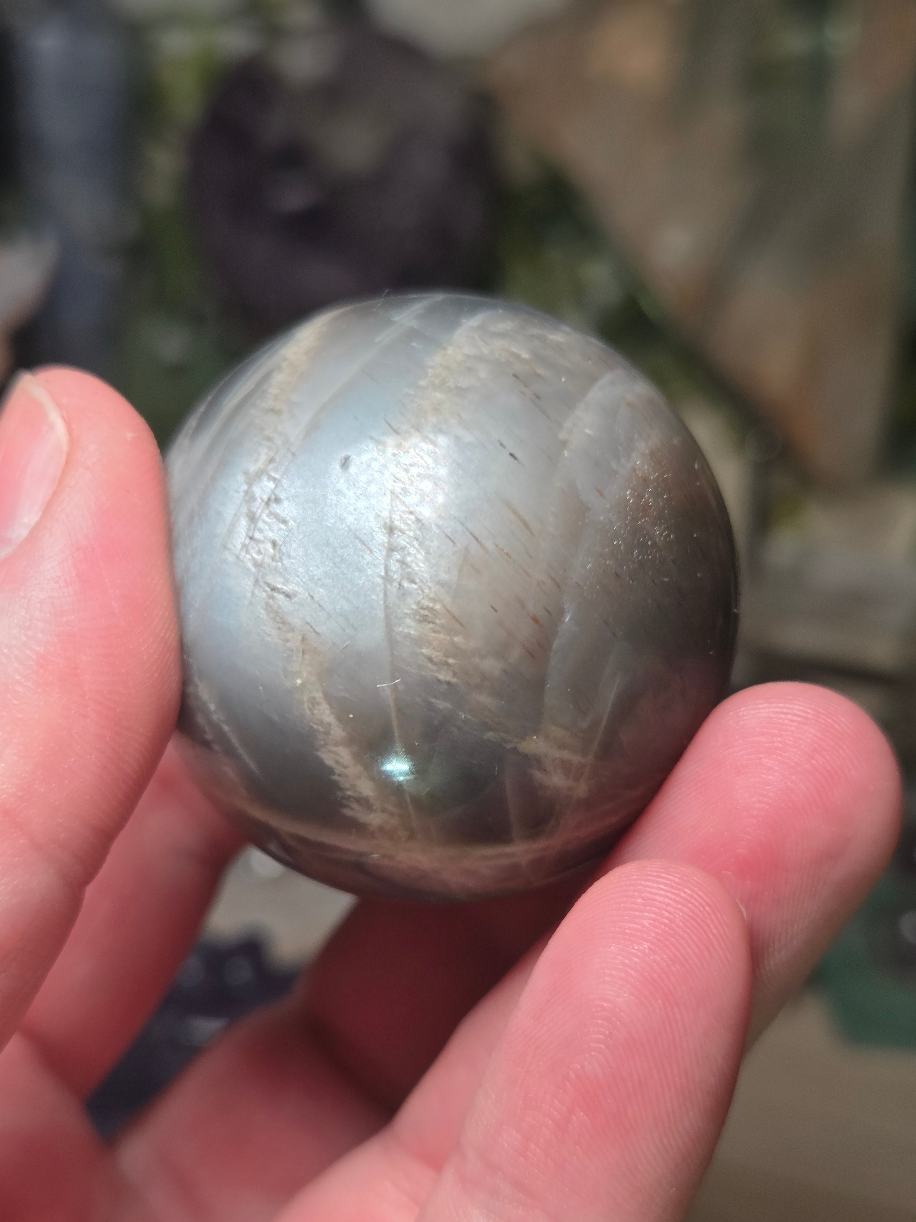 Black Moonstone and sunstone crystal sphere