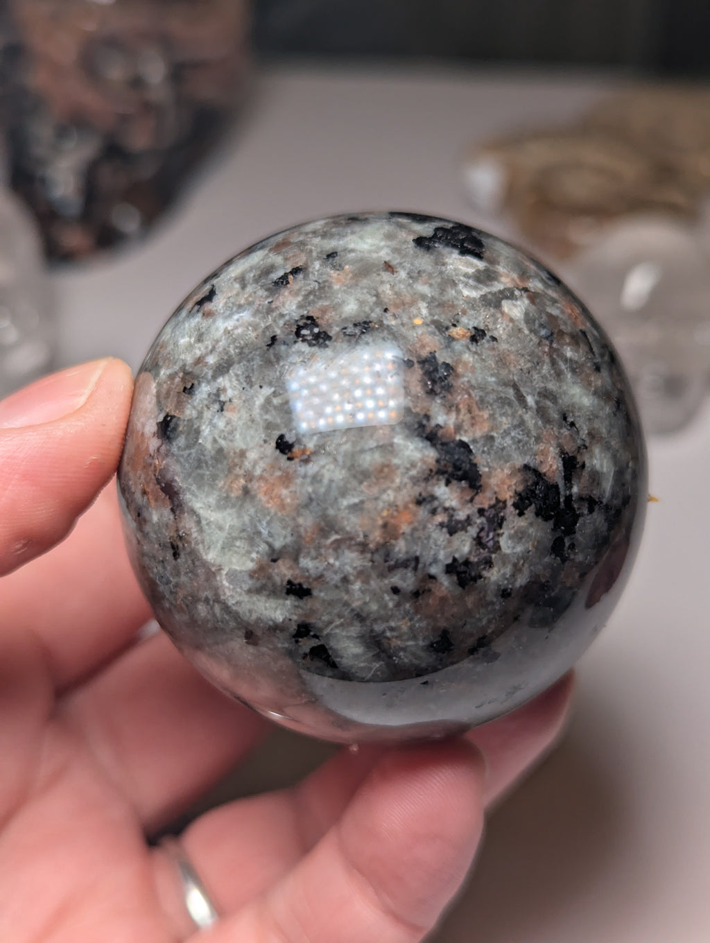 Yooperlite crystal sphere with Orange UV