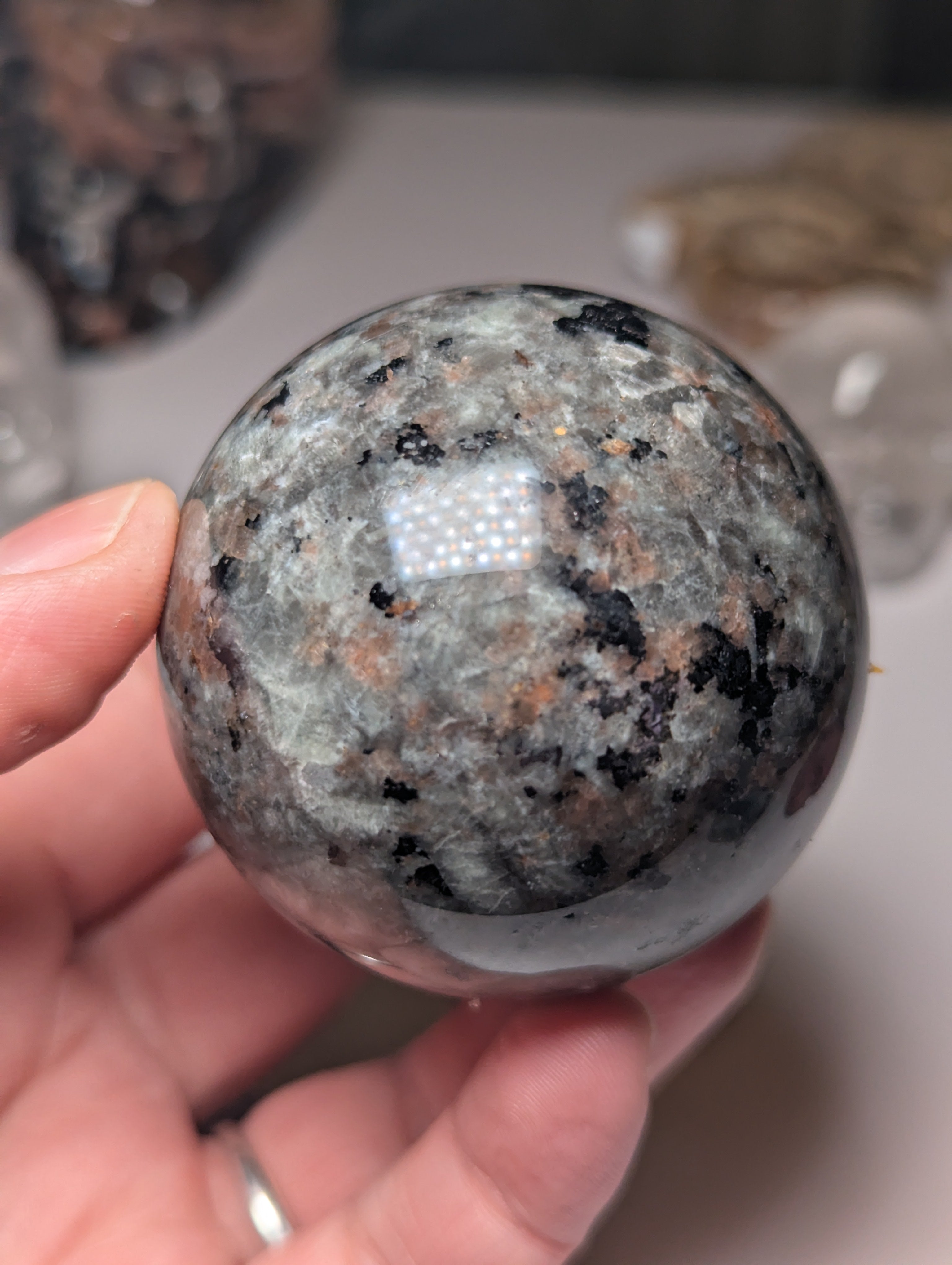 Yooperlite crystal sphere with Orange UV