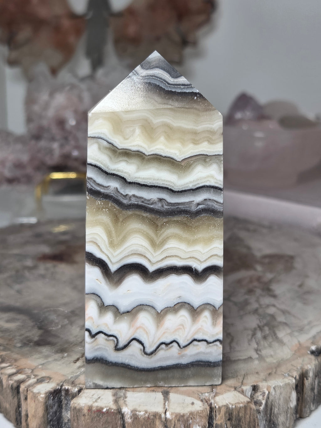 Orange calcite crystal tower