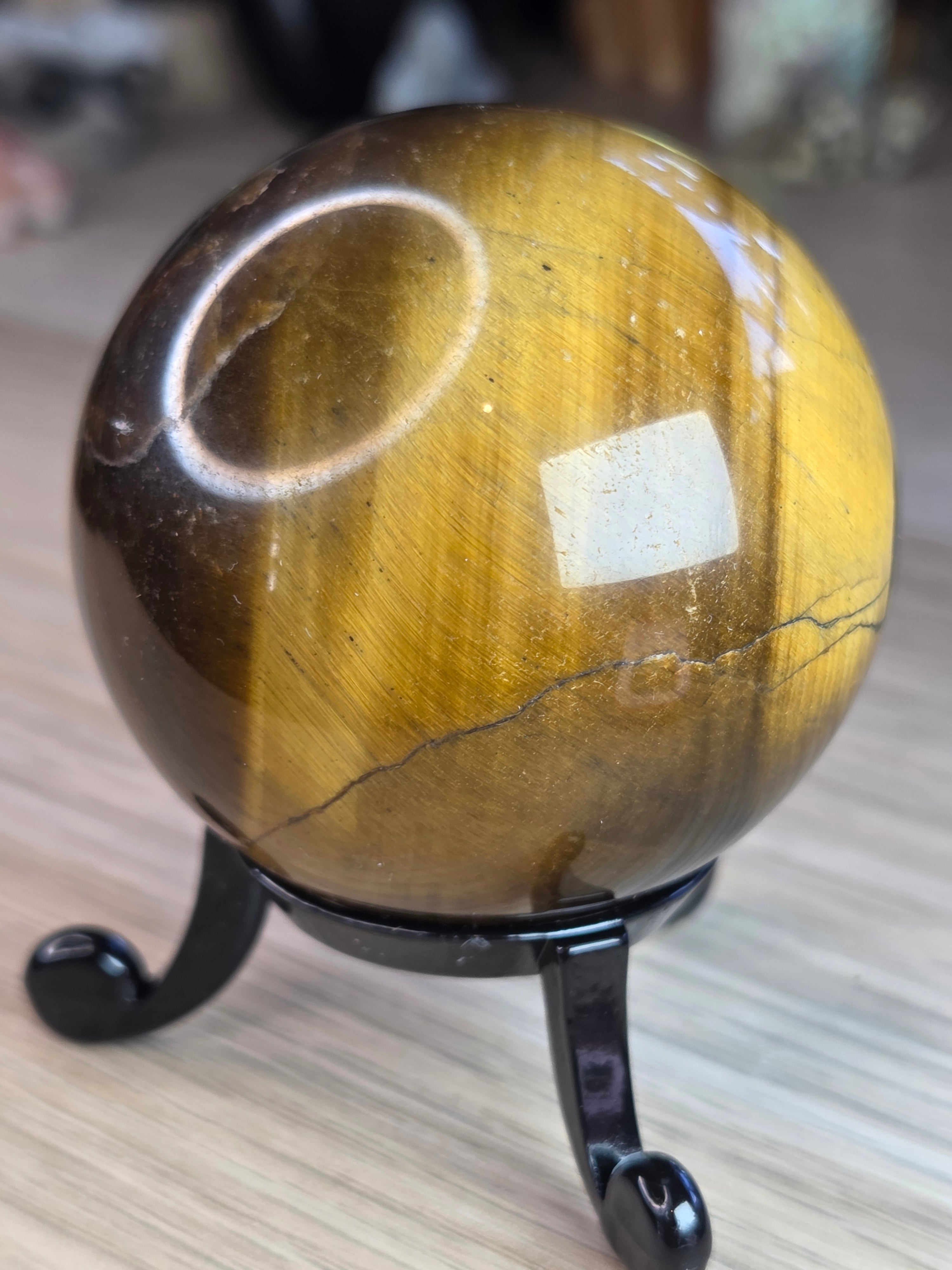 Tigers eye crystal sphere