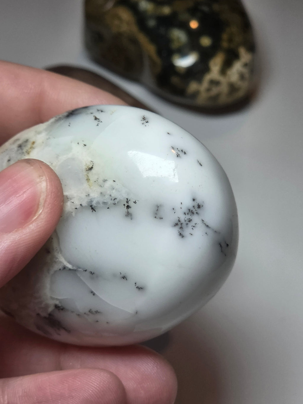 Dendritic opal crystal palm with imperfections