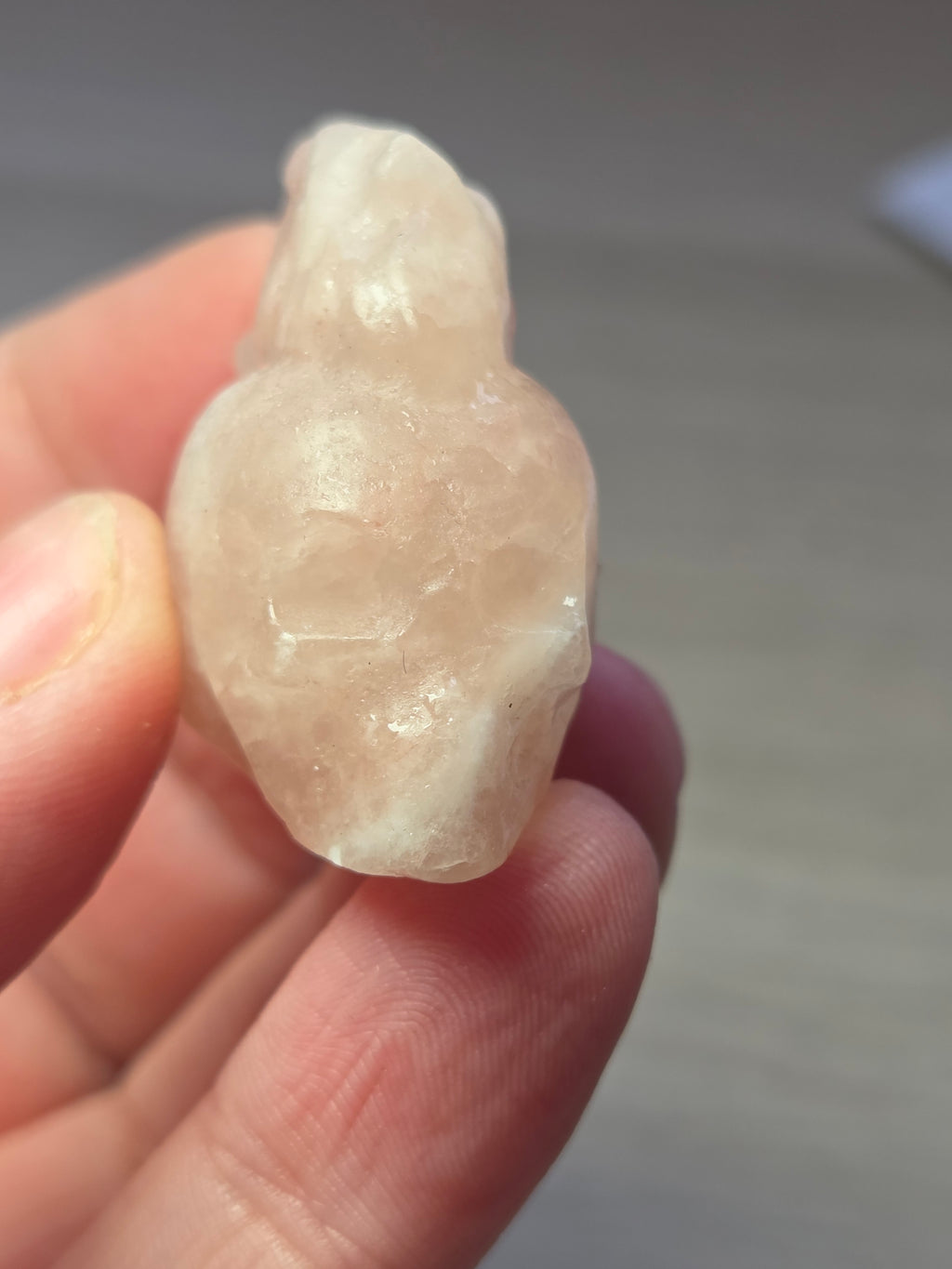 Rose quartz crystal skull rocker