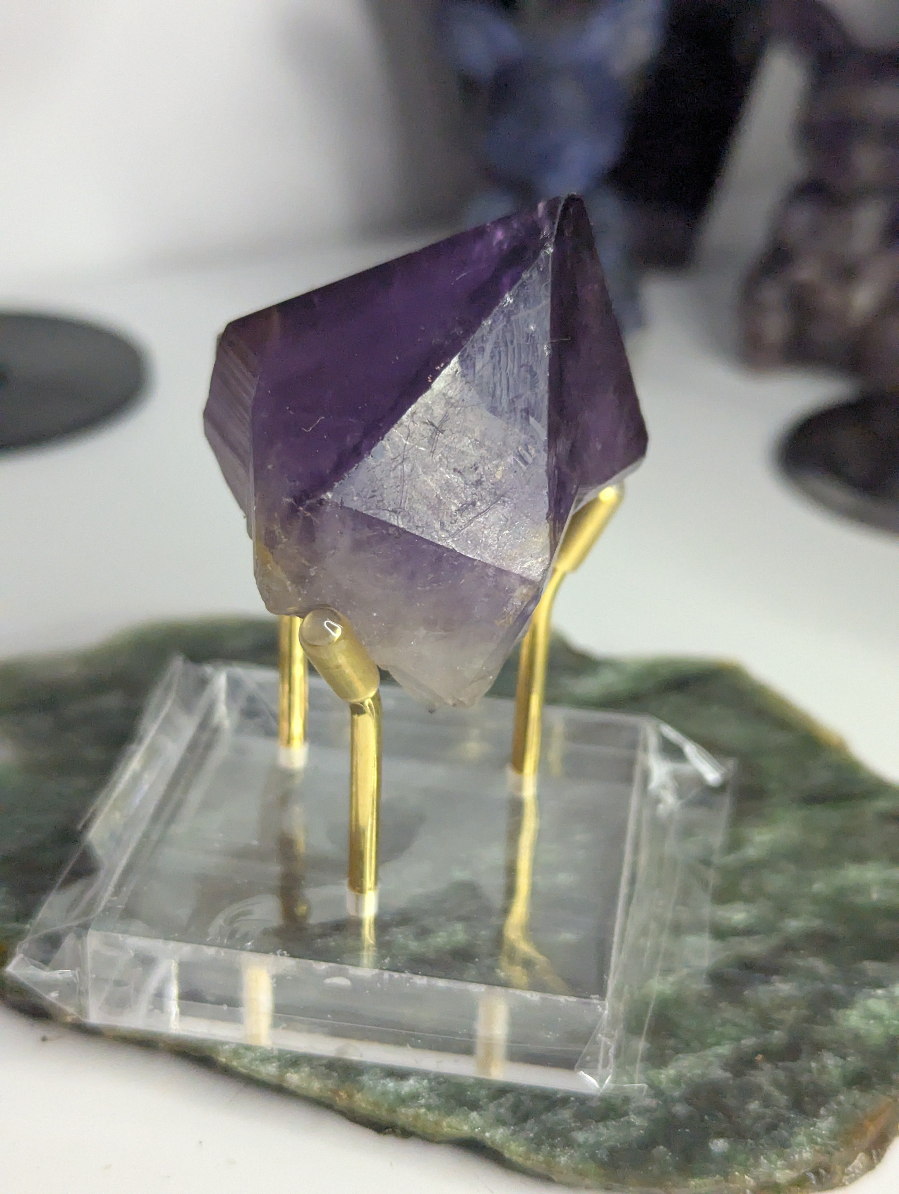Amethyst crystal tooth from Brazil with stand