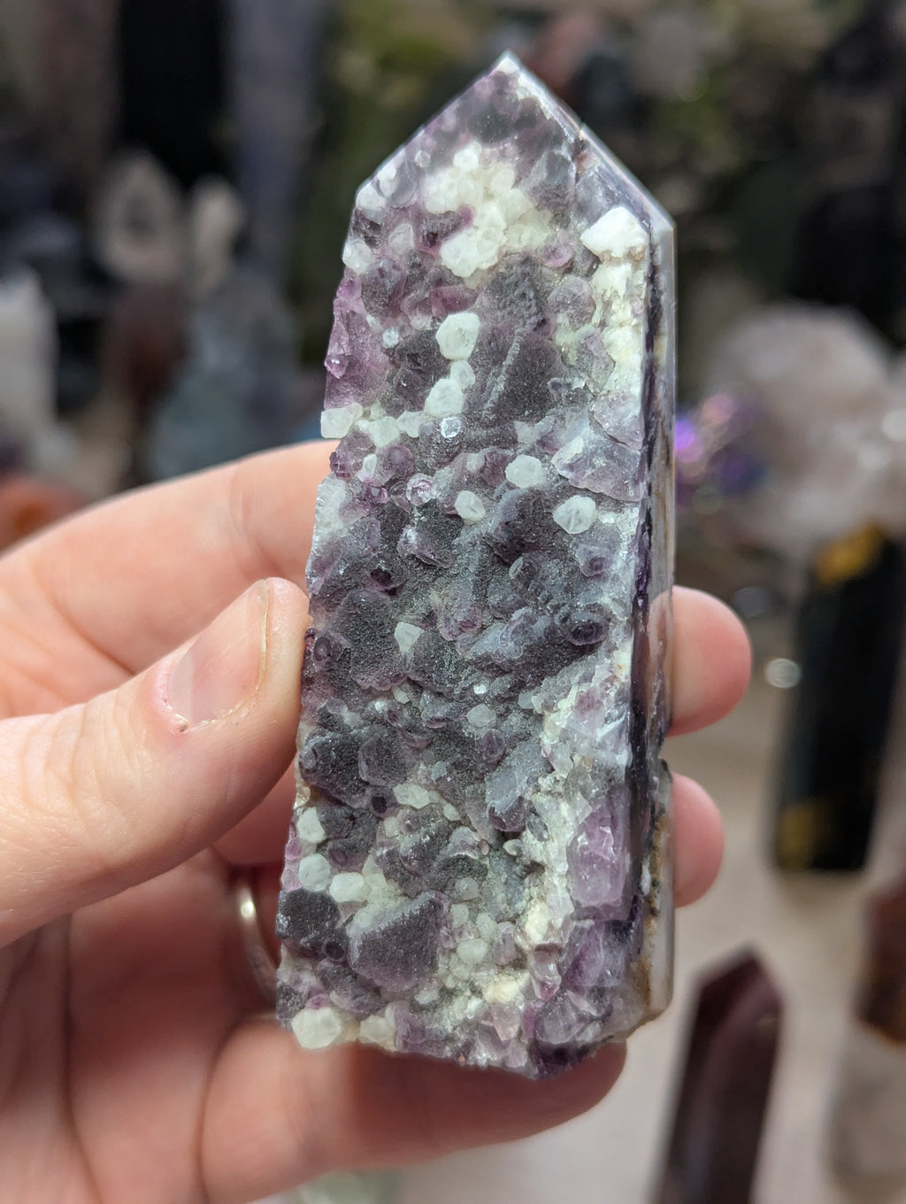 Raw flourite crystal tower carving