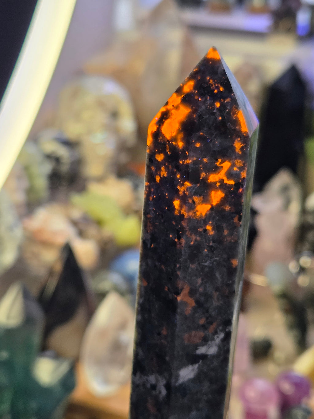 Large Yooperlite crystal tower with orange Uv