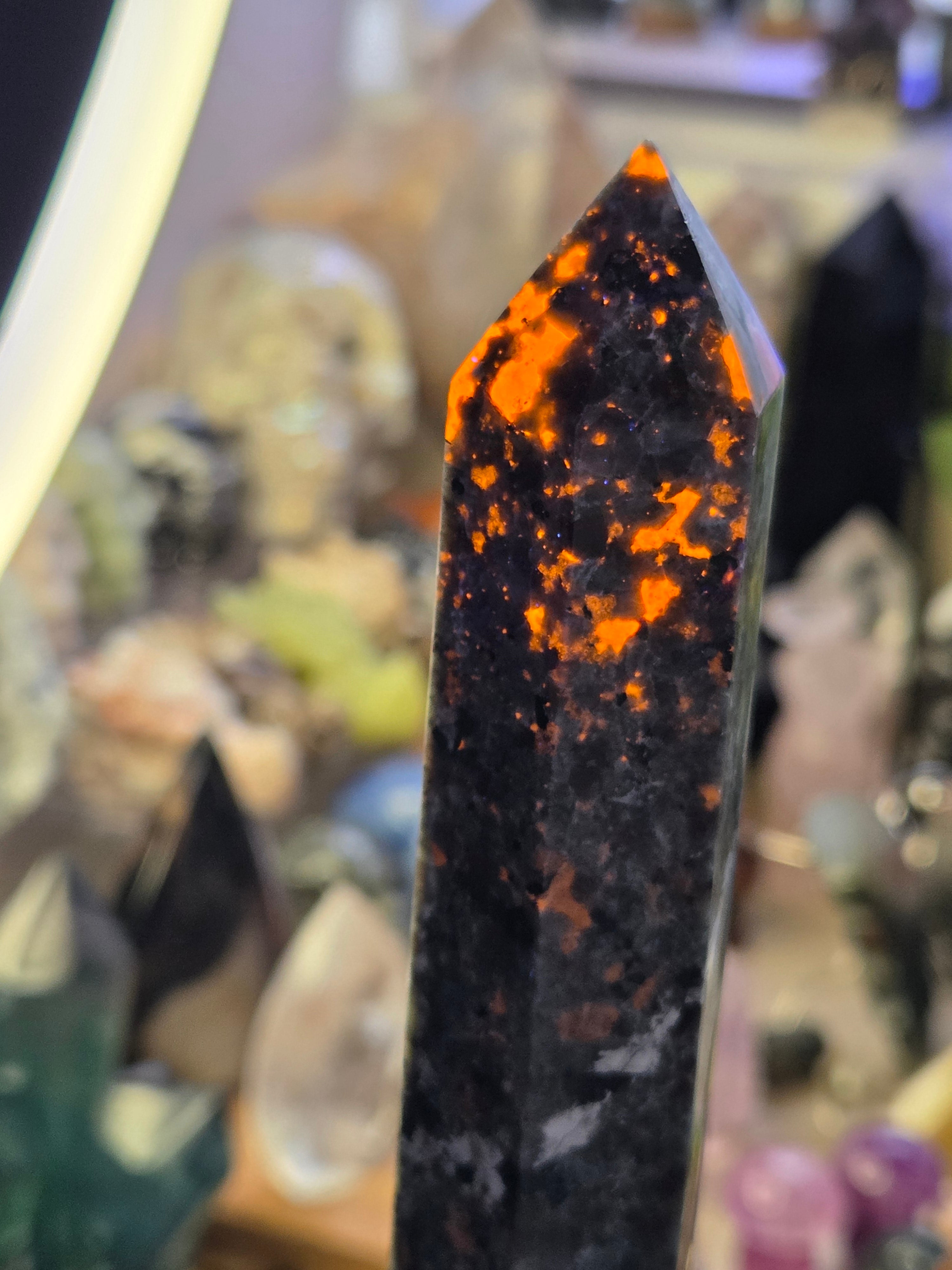 Large Yooperlite crystal tower with orange Uv