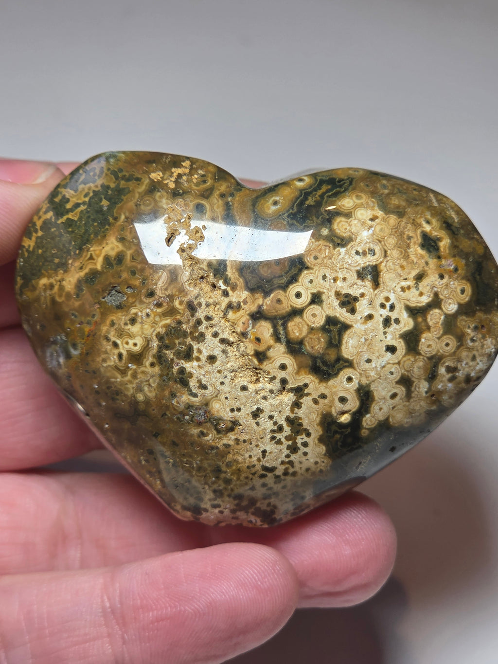 Ocean Jasper crystal heart carving with imperfections