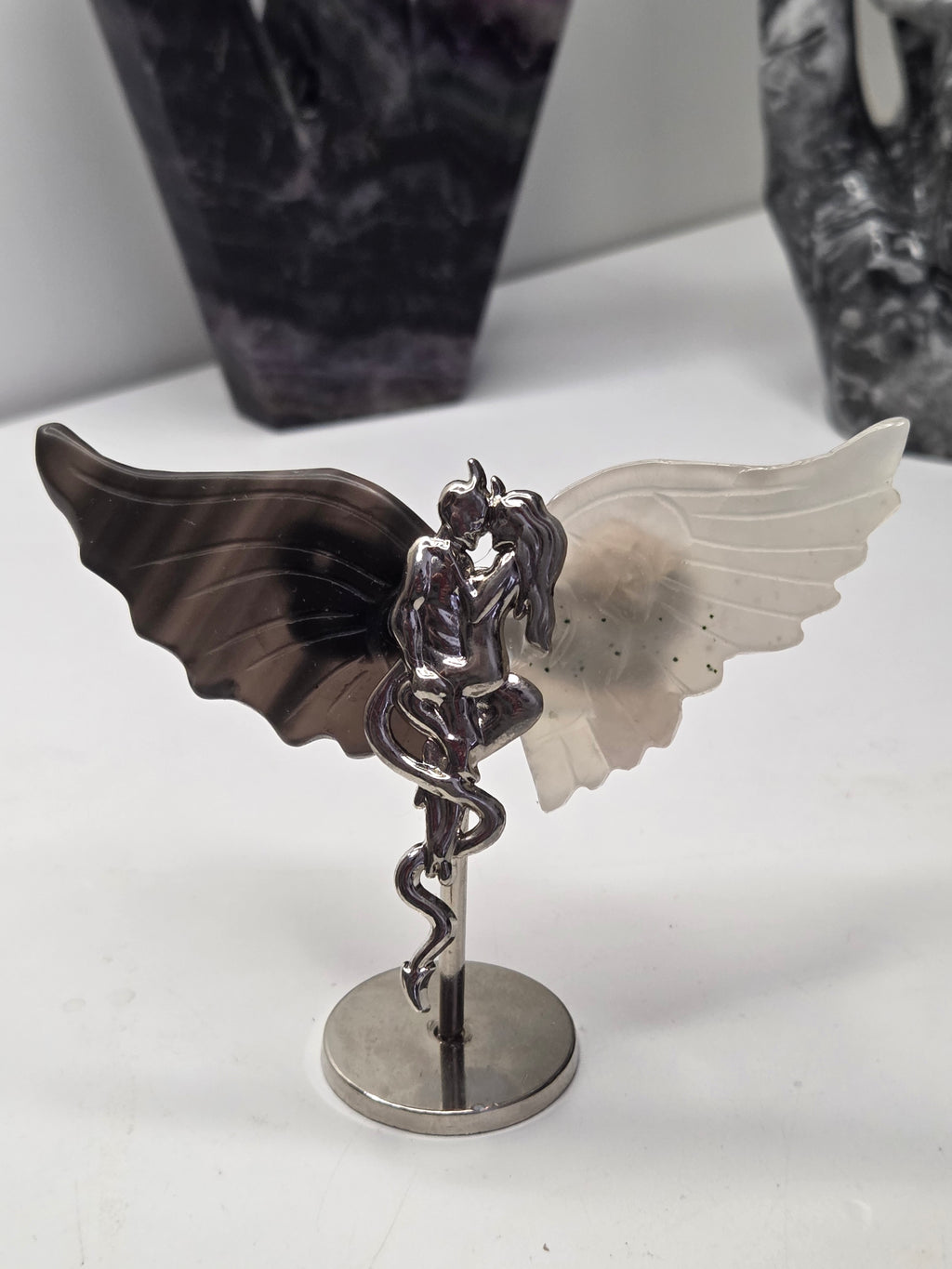 Devil and angel crystal carving
