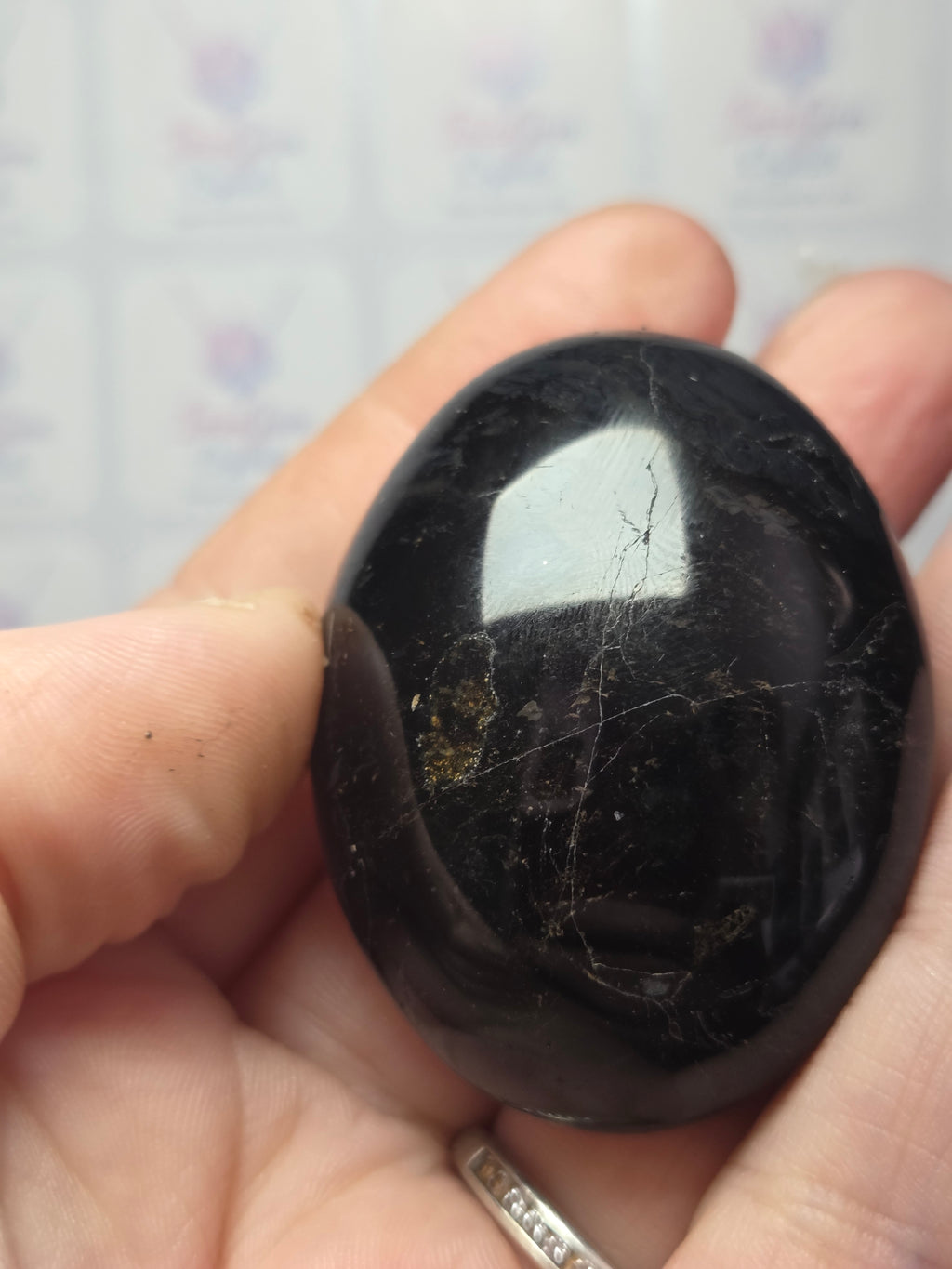 Tourmaline crystal palm stone