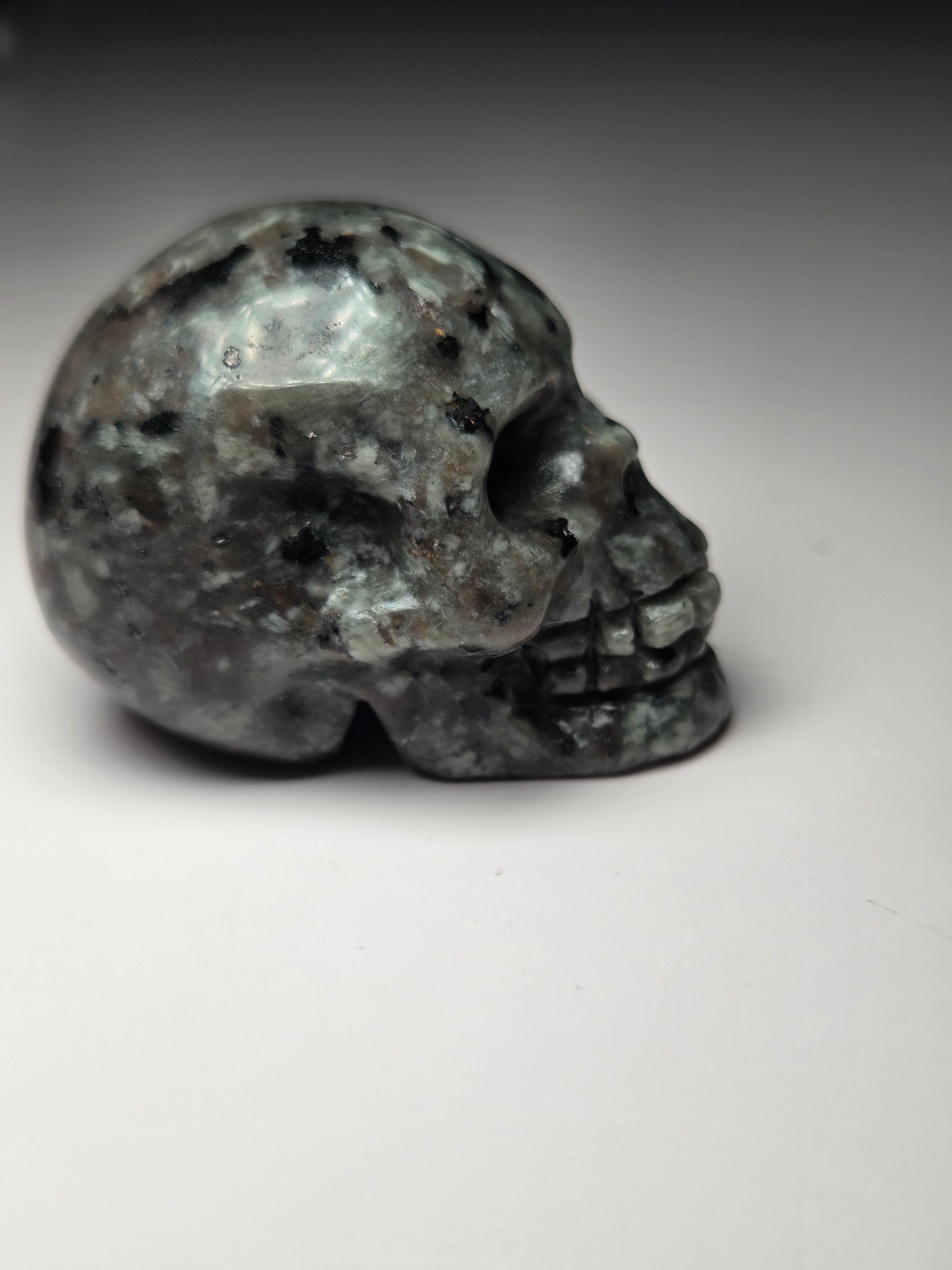 Small Yooperlite crystal skull carving