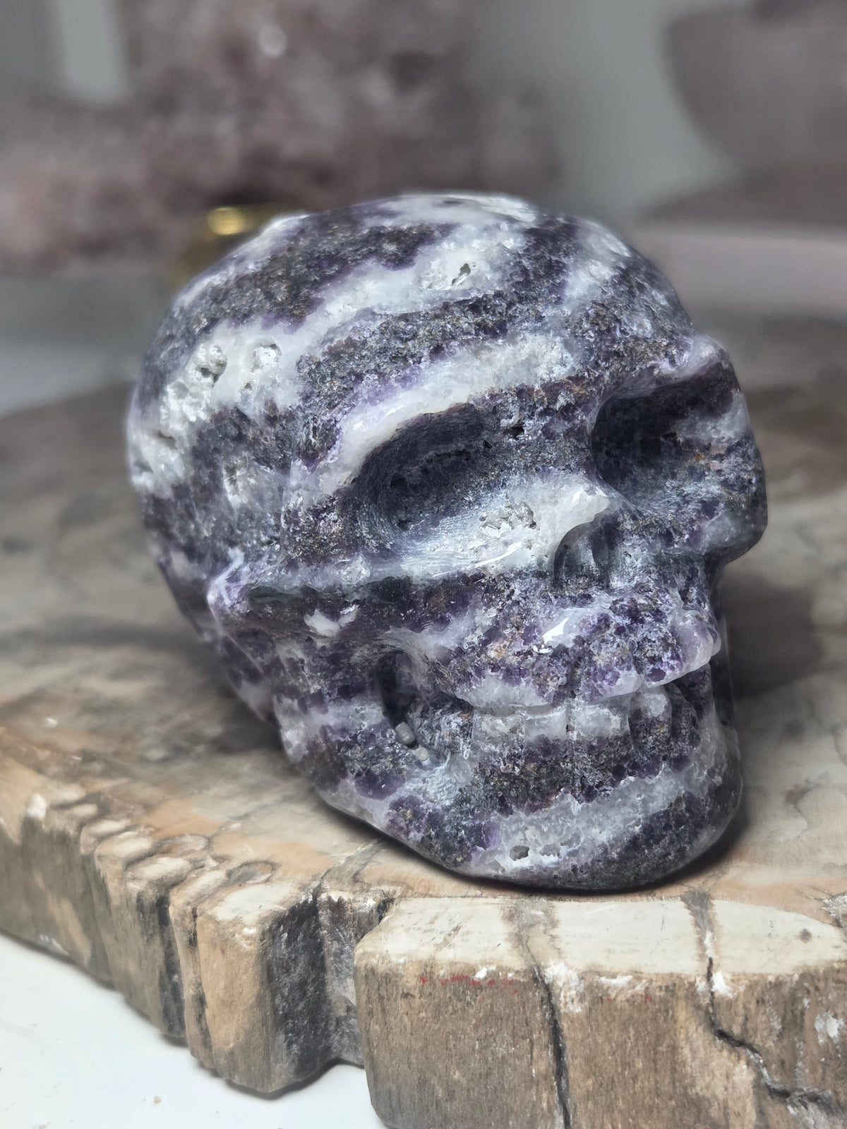 Purple zebra jasper crystal skull carving