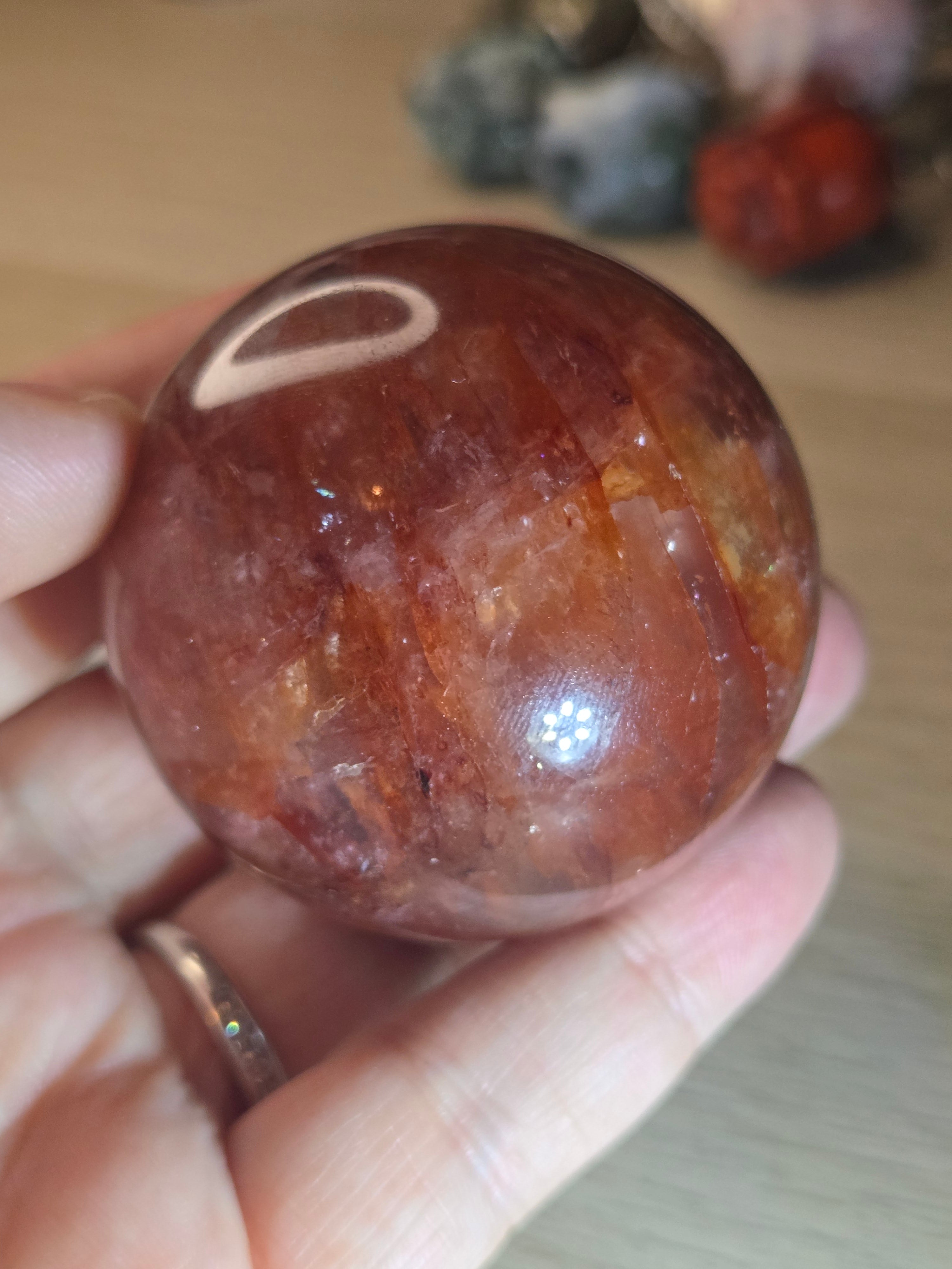 Fire quartz crystal sphere