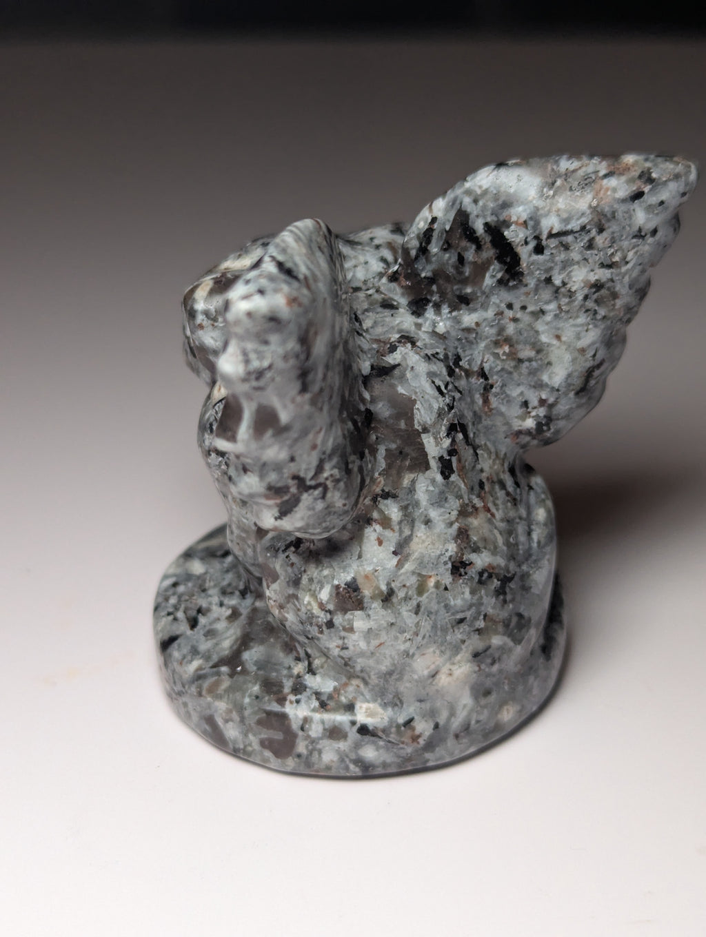 Yooperlite crystal Gargoyle carving orange UV