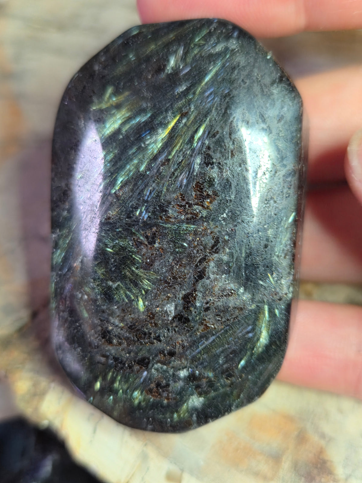 Astrophyllite crystal palm stone