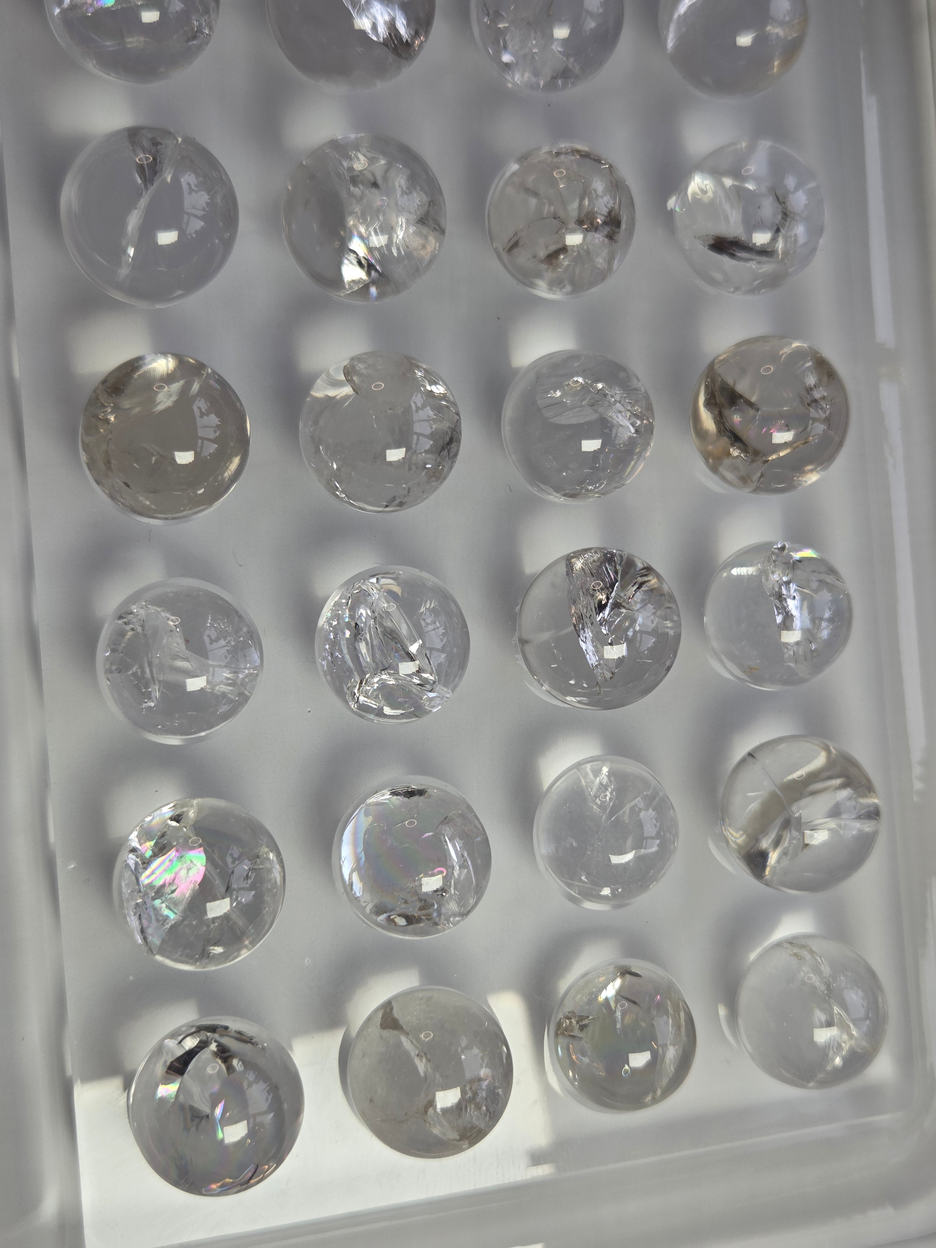 Rainbow clear quartz crystal sphere