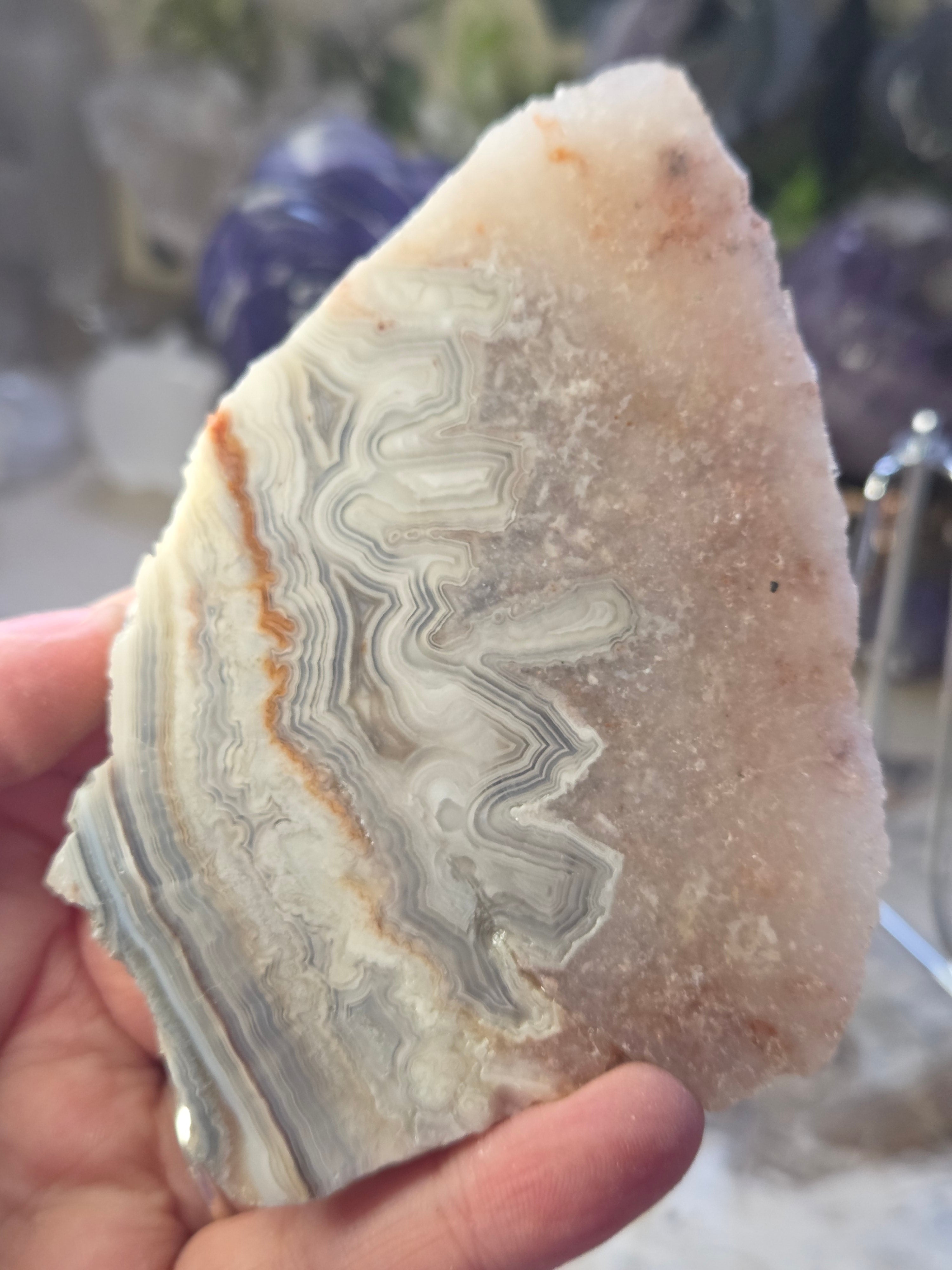 Crazy lace agate crystal slice  with pink amethyst