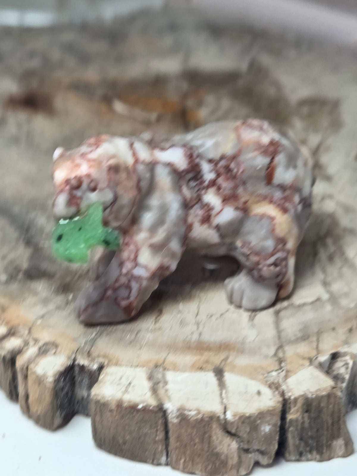 Red Vain Jasper crystal bear carving with fish