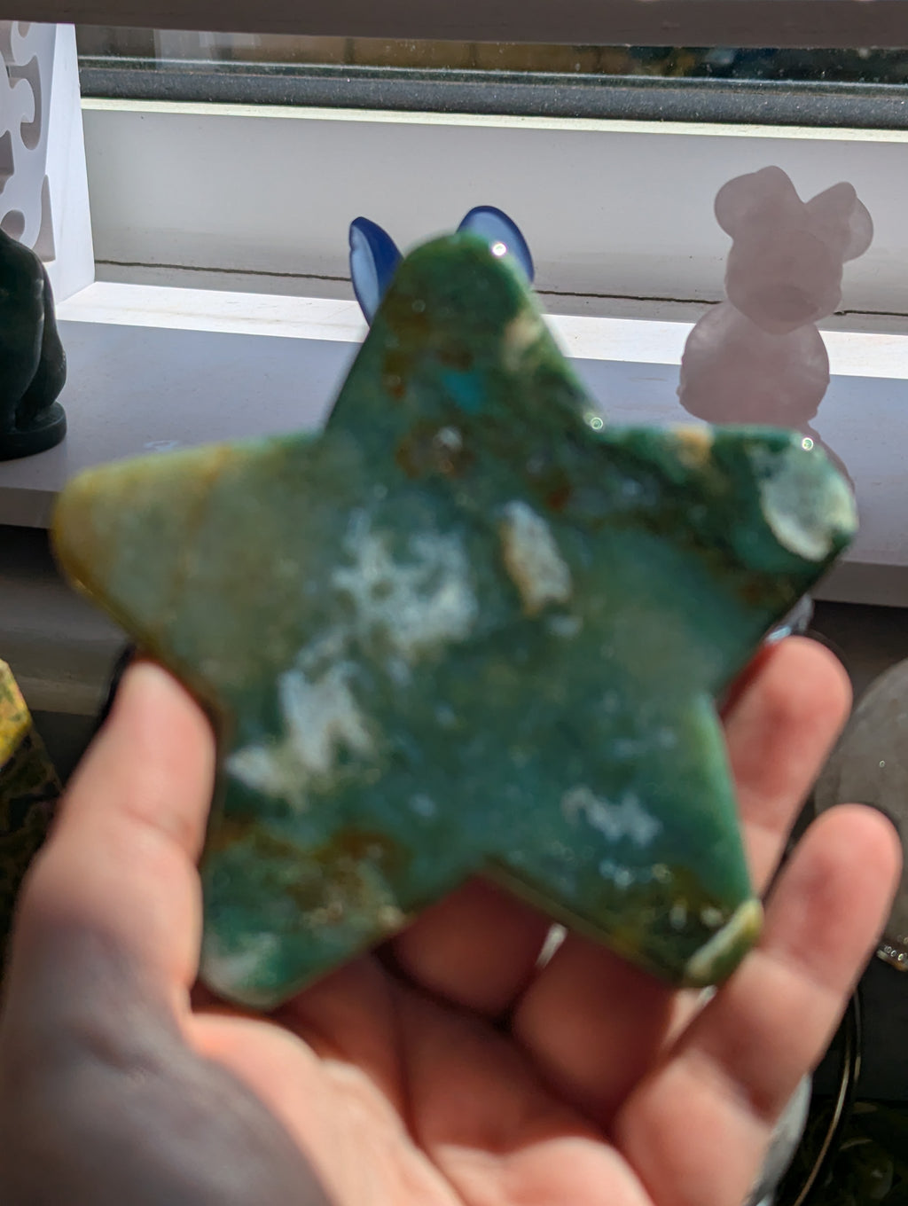 Moss agate crystal star with stand