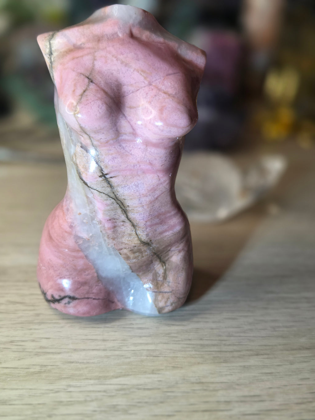 Rhodonite crystal female body carving