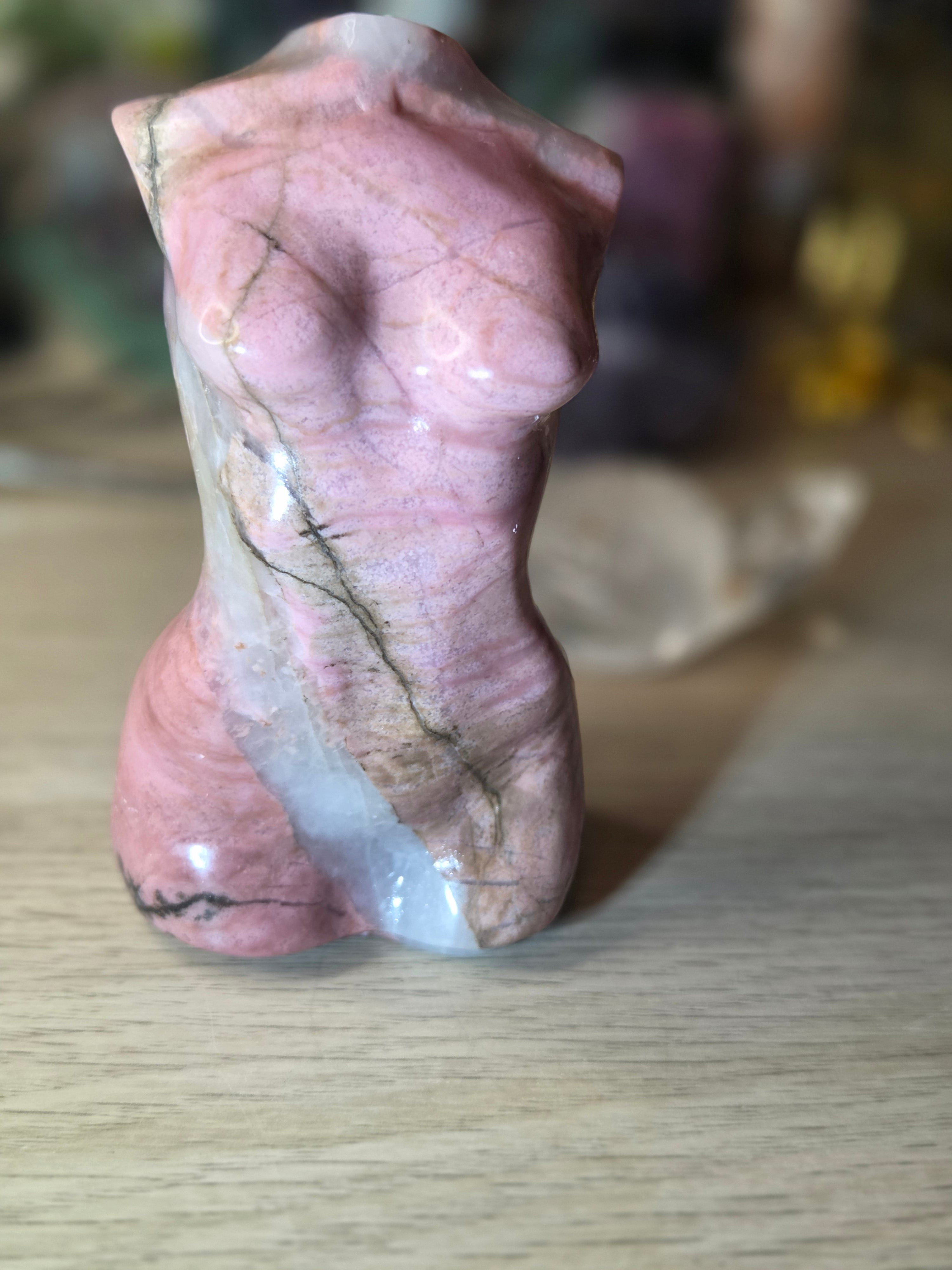 Rhodonite crystal female body carving