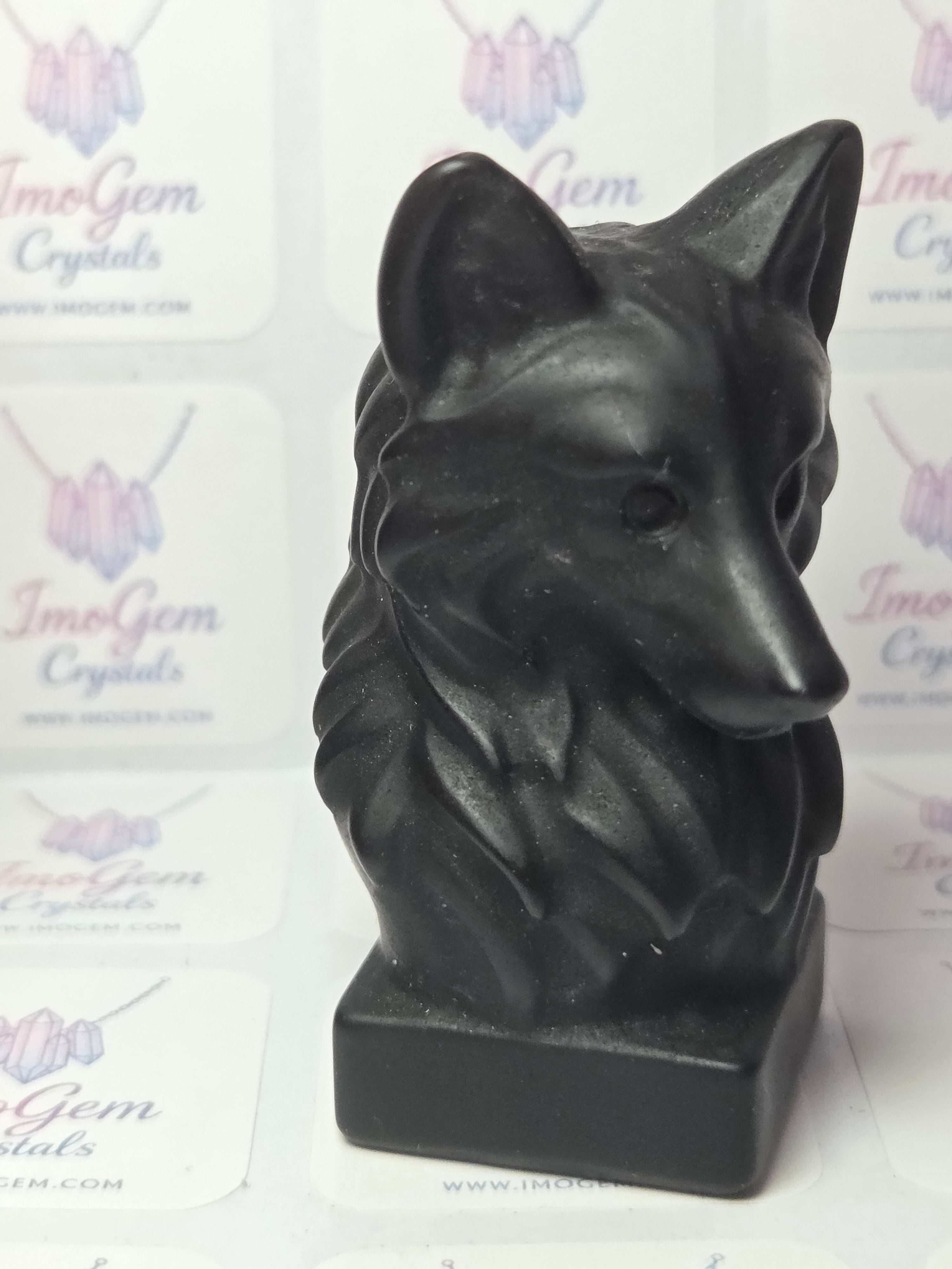 Obsidian crystal wolf head carving