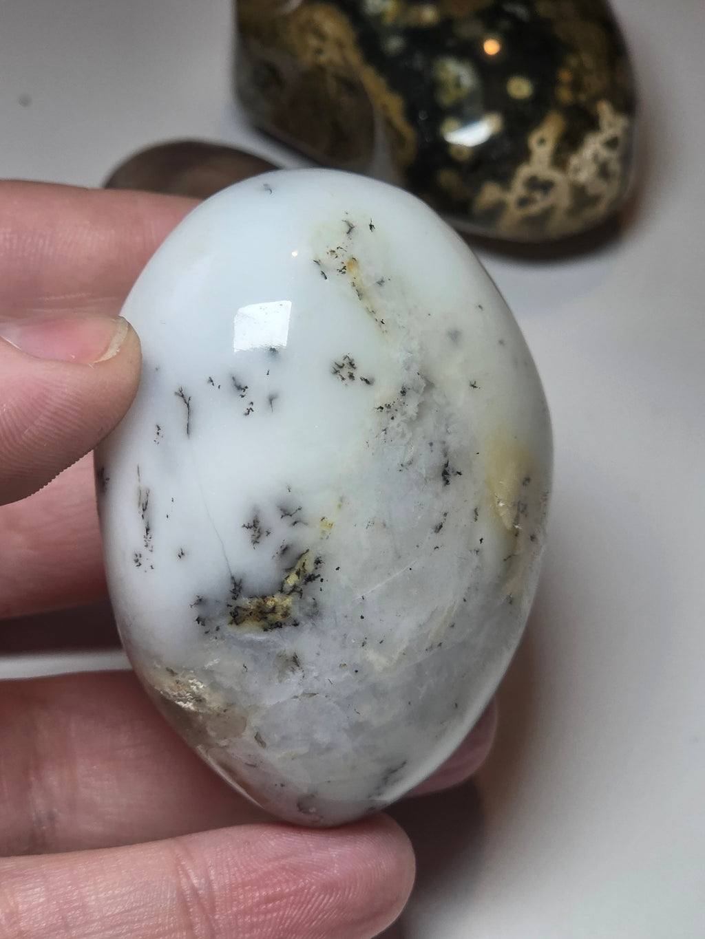 Dendritic opal crystal palm with imperfections