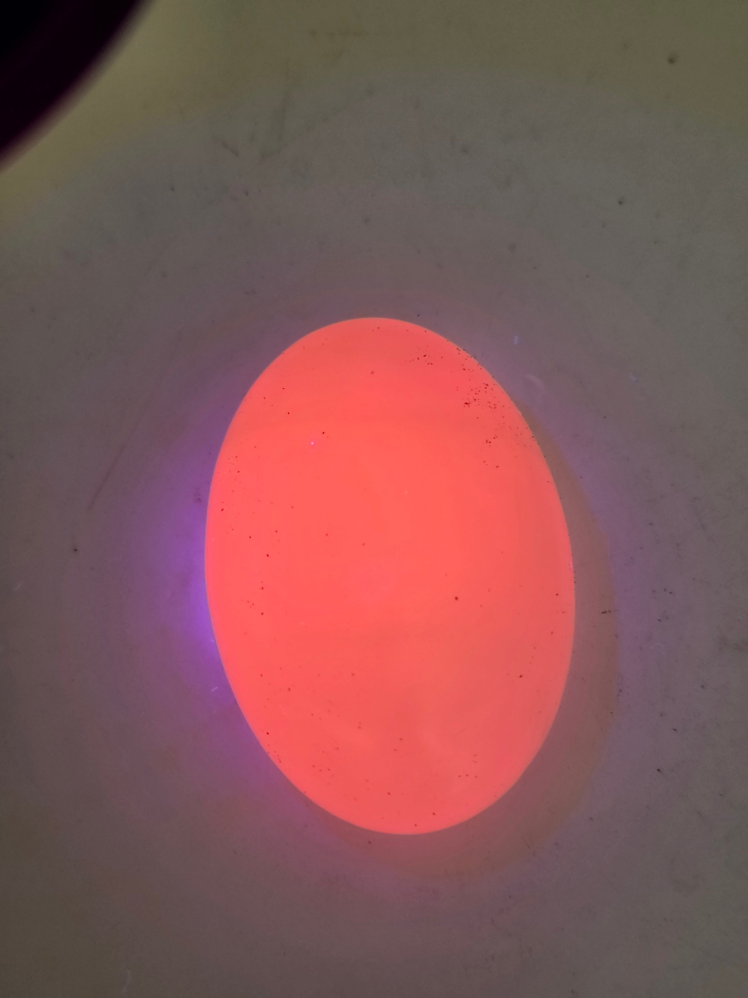 Mango calcite pink UV palm stone