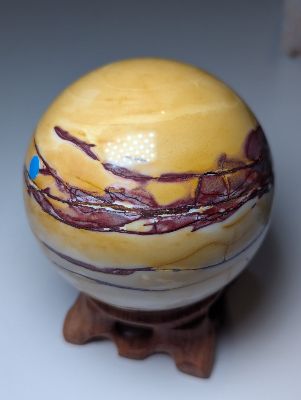 Mookaite crystal sphere with stand