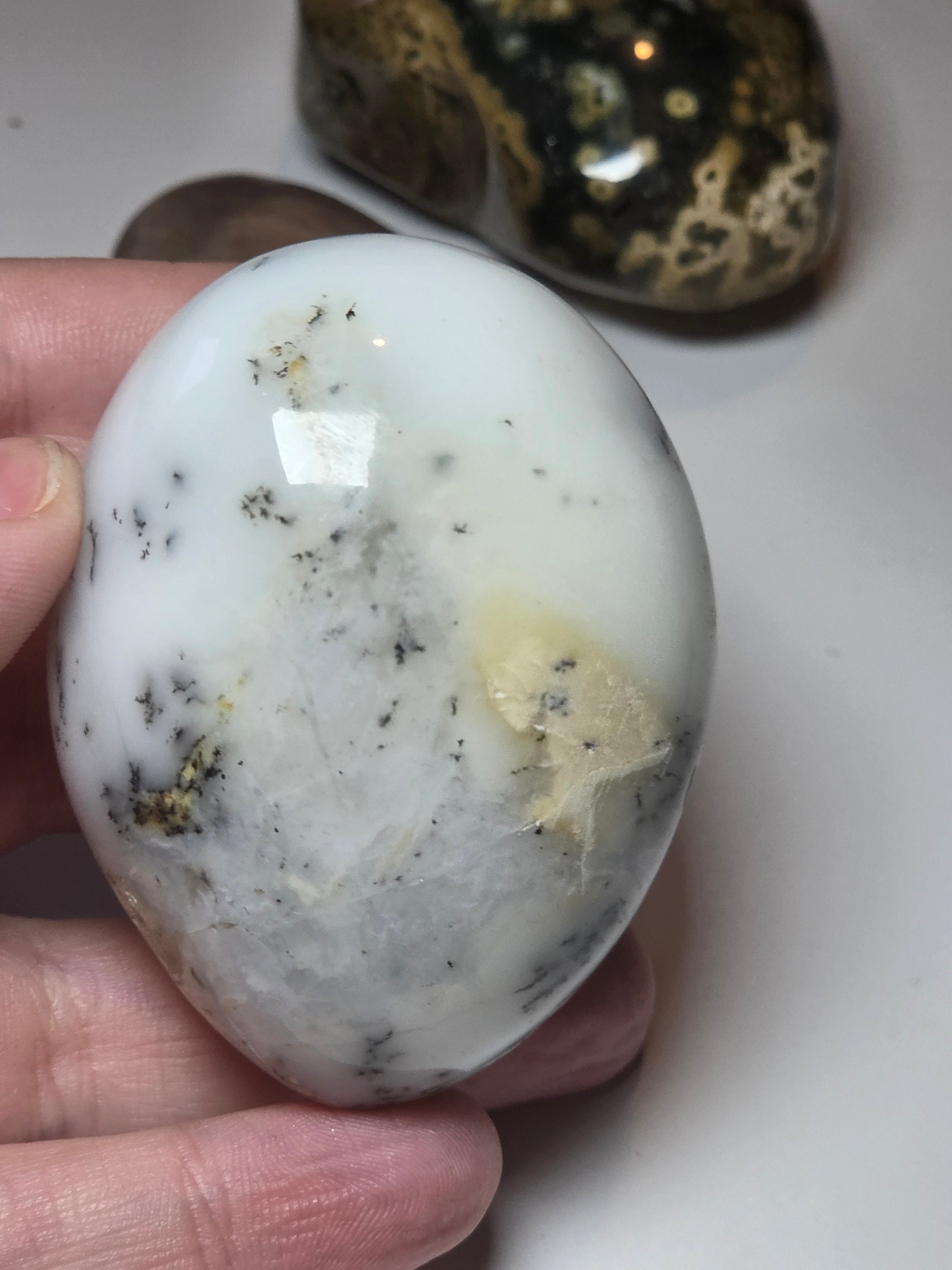 Dendritic opal crystal palm with imperfections