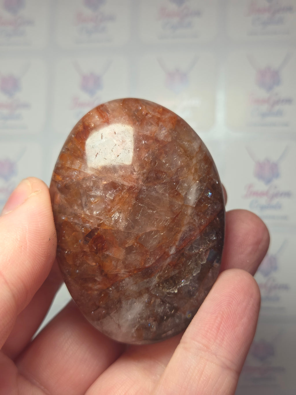 Fire quartz crystal palm stone