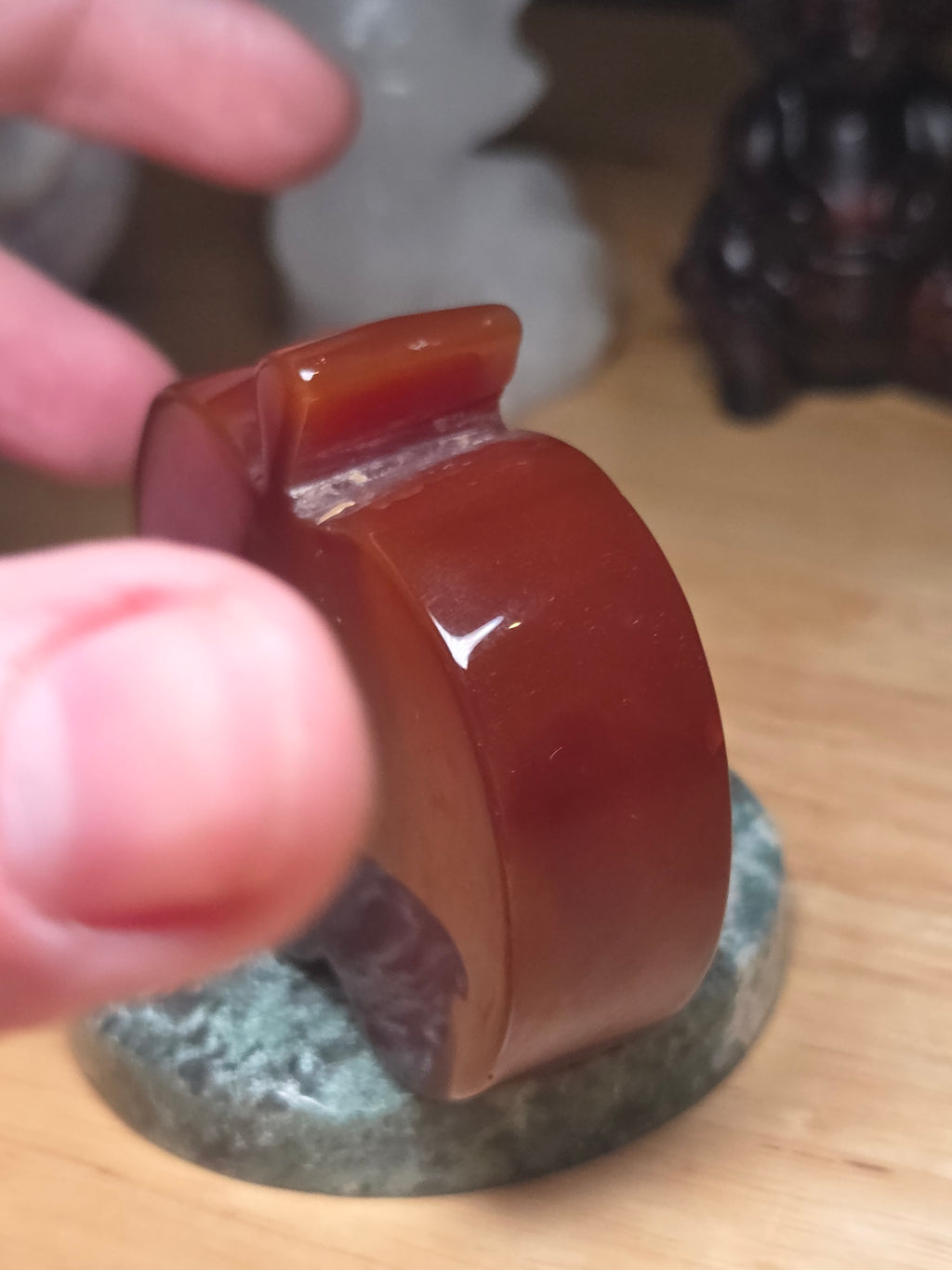 Carnelian crystal apple with imperfections