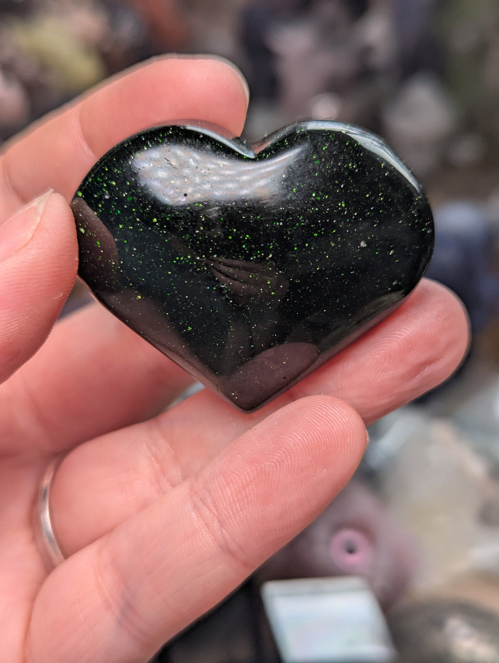 Green sandstone heart carving