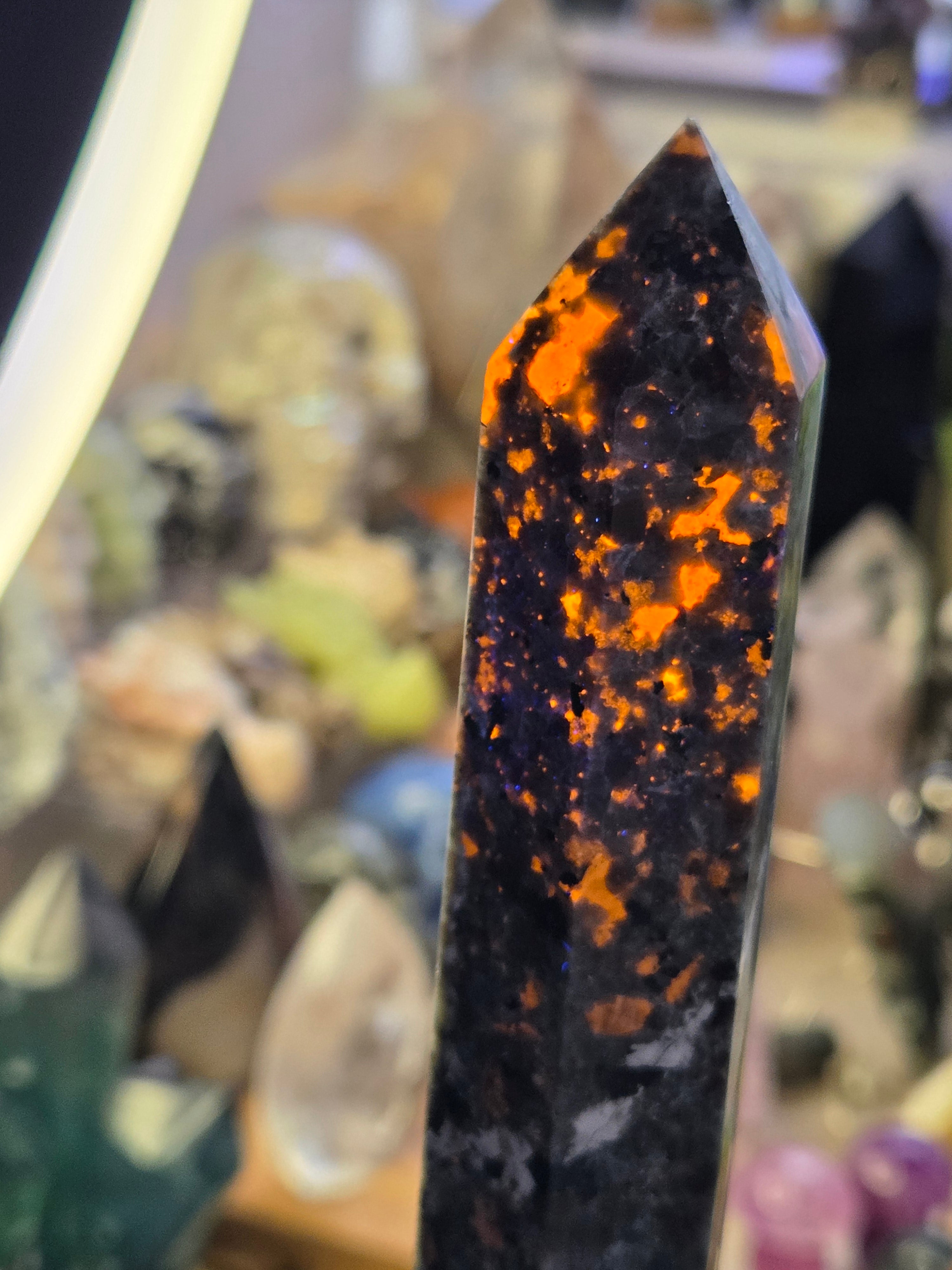 Large Yooperlite crystal tower with orange Uv