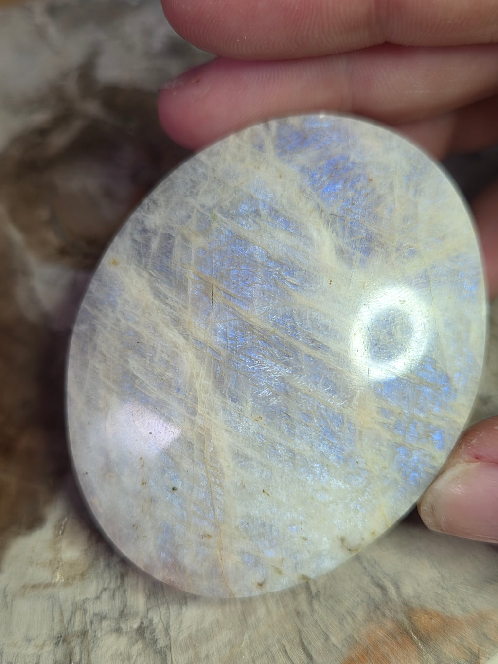 Beautiful crystal moonstone palm stone